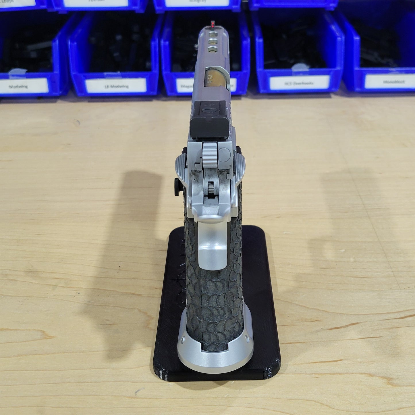 For the best 3D-printed 2011 & Springfield Prodigy Pistol Stand, perfect for storing and displaying your favorite handgun; shop Four Brothers 4BROS Holsters.