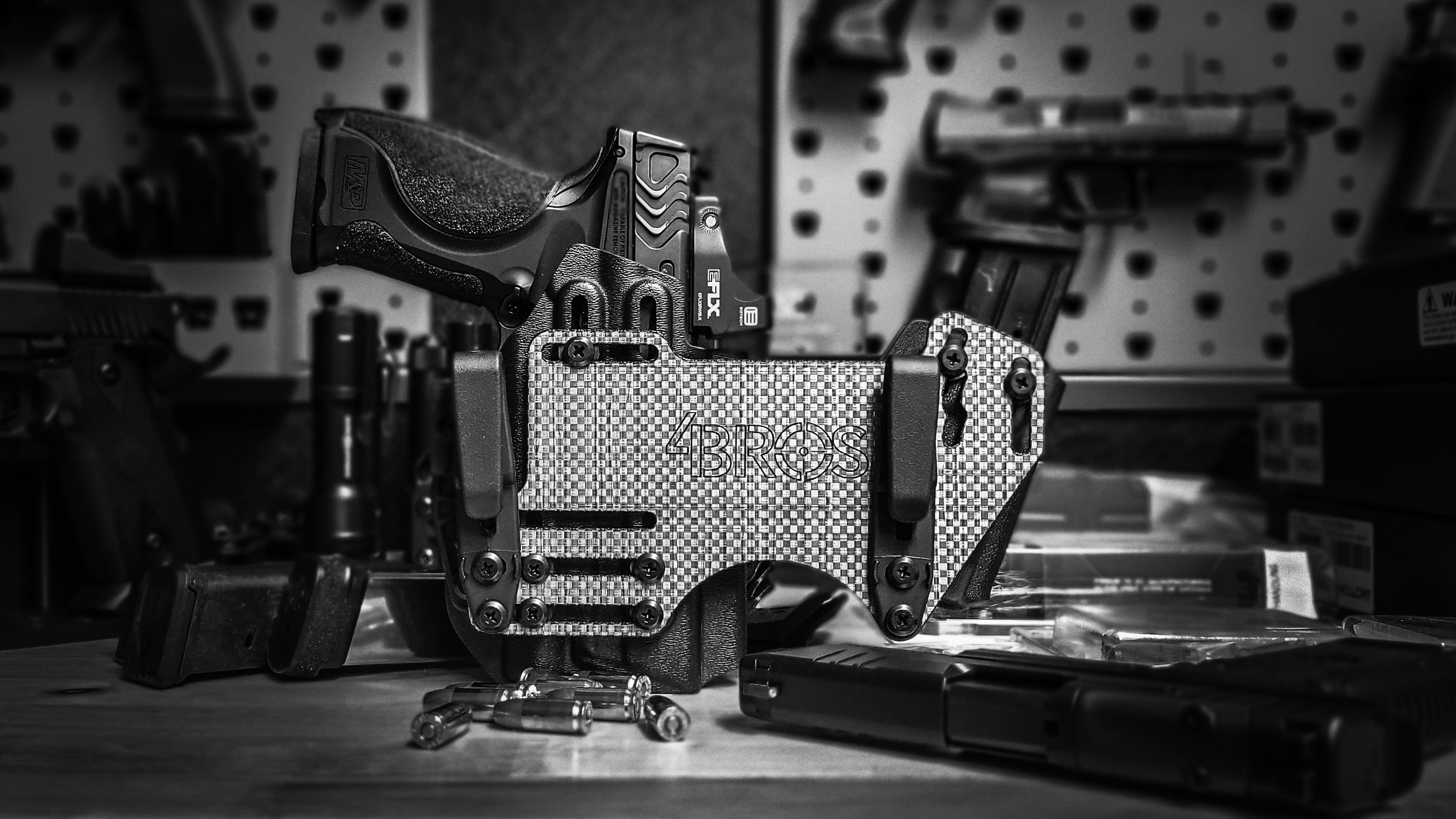The 4Bros Holsters Fat Guys Appendix Rig for pistol and magazine black and white image.