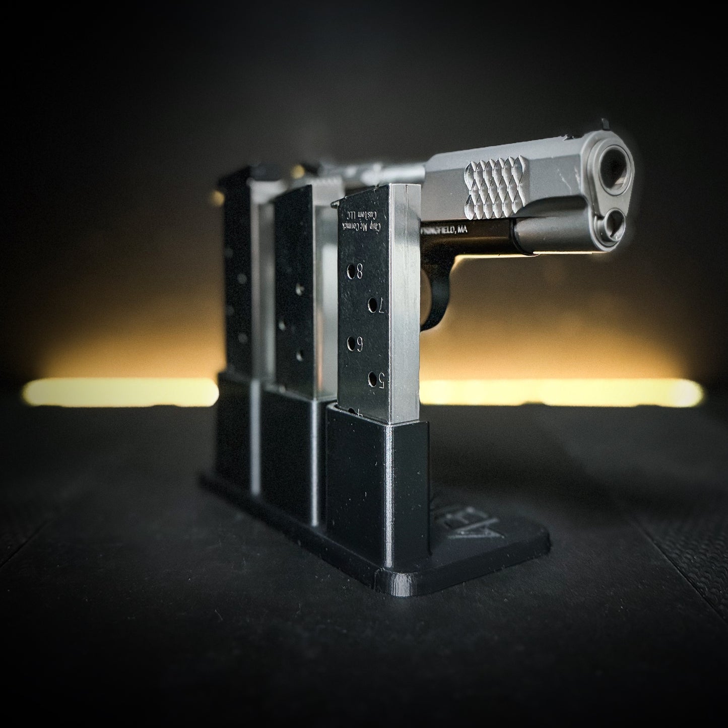 3D-printed 1911 Pistol & Magazine Stand is designed to hold a standard single-stack 1911 handgun along with three 1911 magazines
