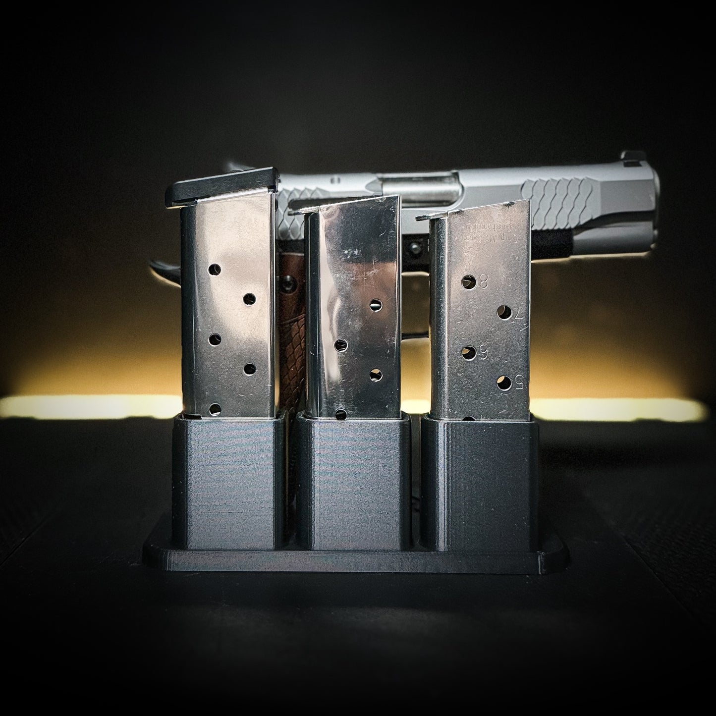3D-printed 1911 Pistol & Magazine Stand is designed to hold a standard single-stack 1911 handgun along with three 1911 magazines
