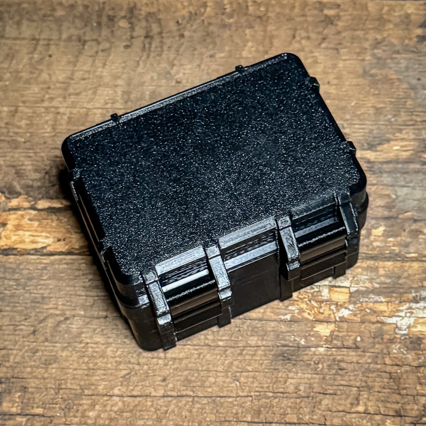 4BROS 3D-printed battery box for firearm, optic, and emergency batteries. Organizes AA, AAA, CR123, 18650, CR1632, and CR2032 batteries. Made in the USA.