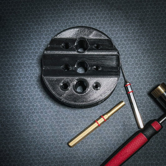 Armorer & Gunsmith 3D-printed Universal Bench Block from Four Brothers Holsters makes the removal of pins from firearms & devices simple, easy, and quick.