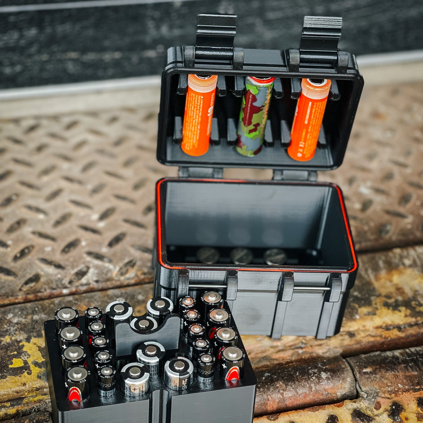 For the best 3D printed Rugged Battery Box designed to fit AAA, AA, CR123, 18650, CR1632, and CR2032 batteries, shop Four Brothers 4BROS Holsters. US Made.
