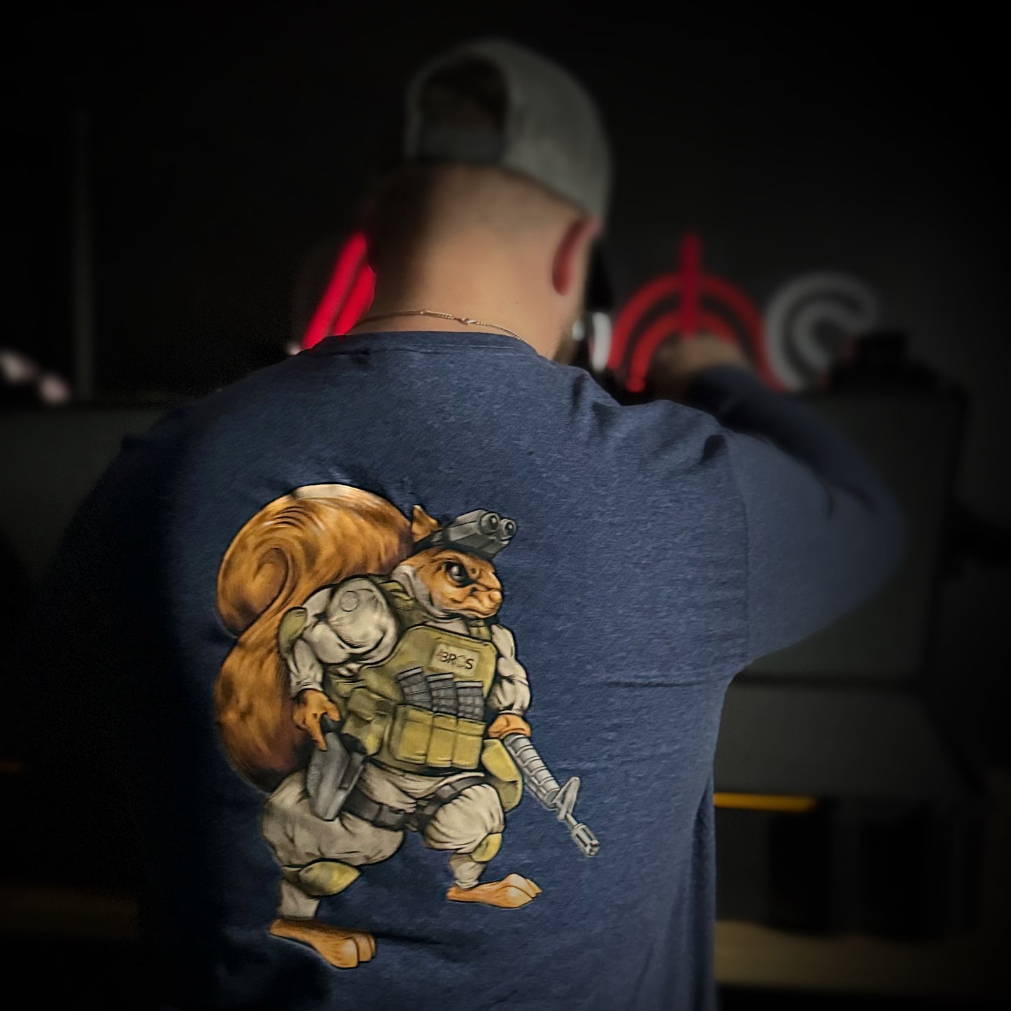 Show off your wild side with the 4Bros Holsters "Dirt the Squirrel" long-sleeve tee! Soft, stylish, and durable, it's perfect for adventures or casual wear.