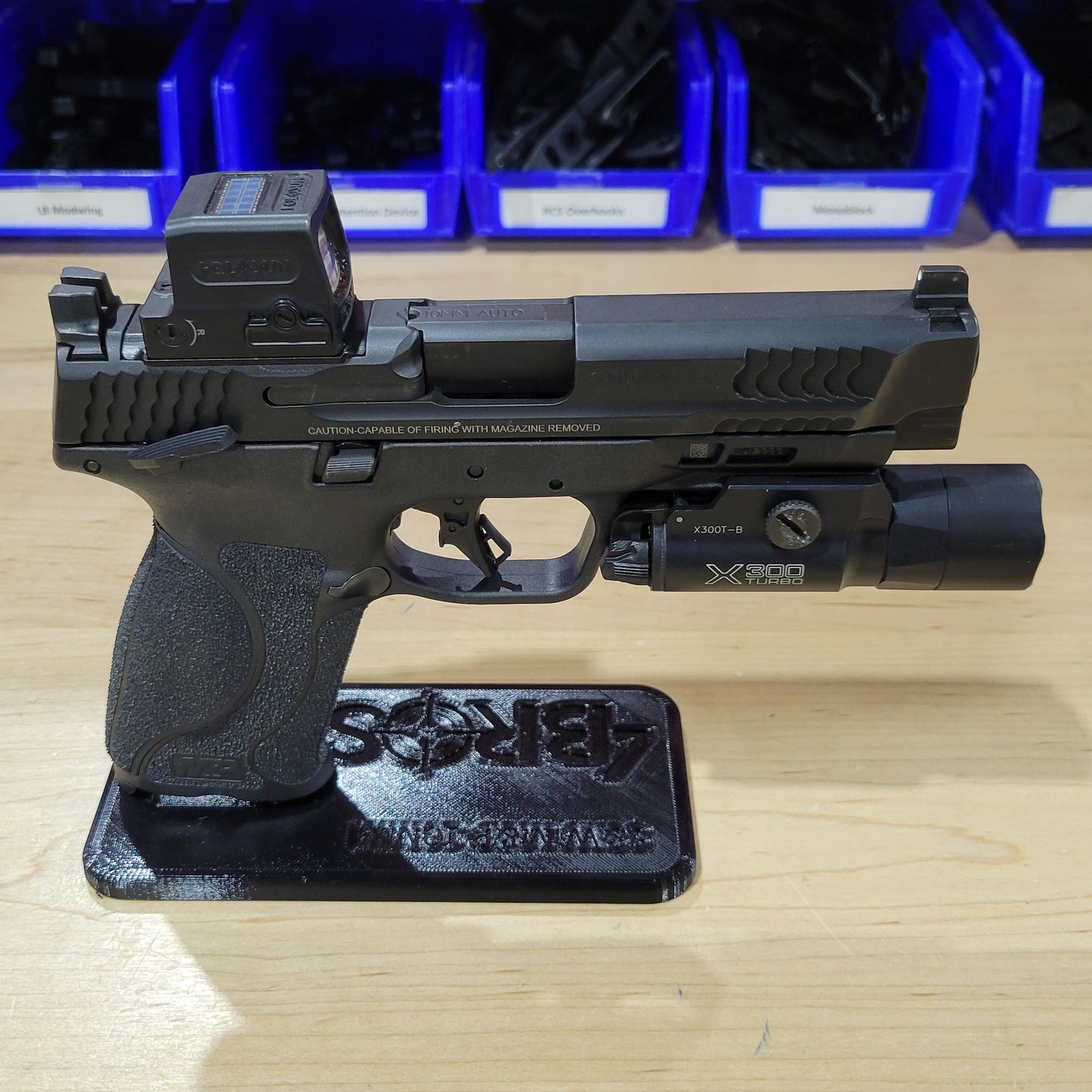 For the best 3D-printed Smith & Wesson 10mm pistol stand, perfect for storing and displaying your favorite handgun shop, Four Brothers 4BROS Holsters.