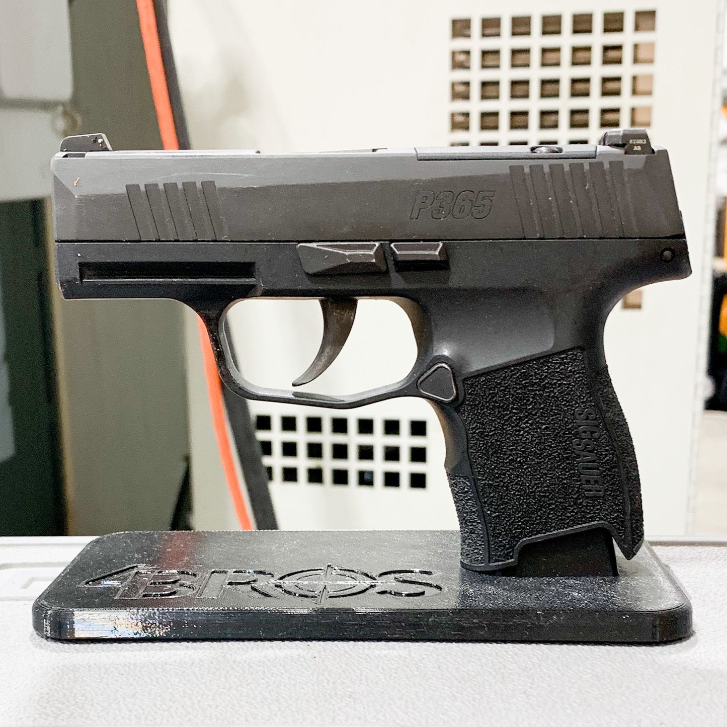 For the best 3D-printed Subcompact Pistol Stand confirmed to fit the Sig P365, P365XL, P365-XMACRO, Glock 43X & 48, Hellcat & Hellcat Pro, shop 4BROS Holsters.