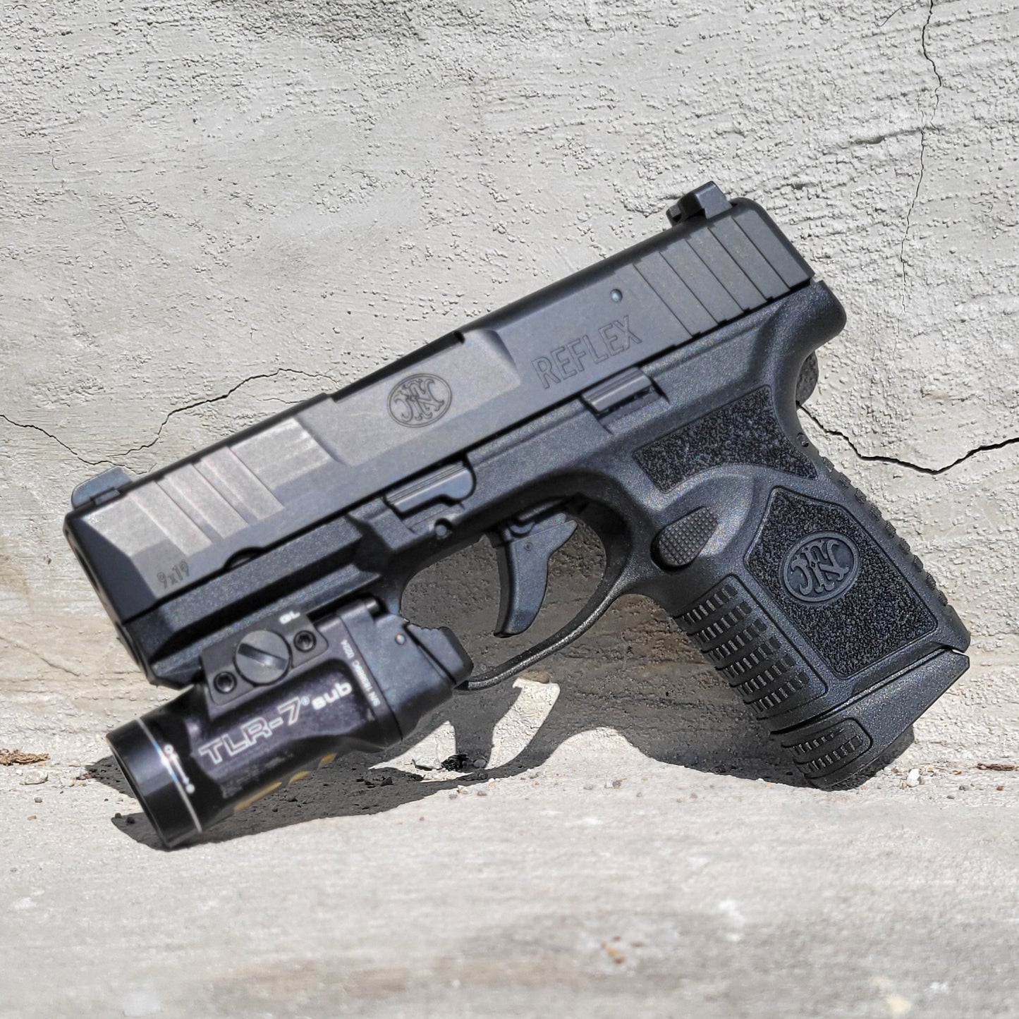 For the best IWB Kydex Inside Waistband Holster for the FN Reflex pistol with the Streamlight GL TLR-7 Sub (69400), shop Four Brothers 4BROS Holsters.