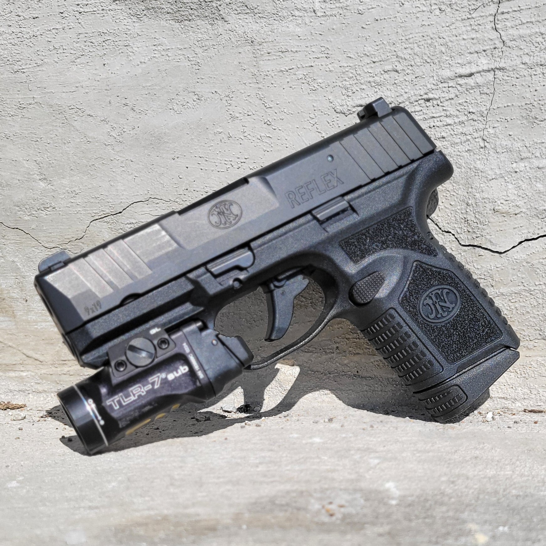 For the best IWB Kydex Inside Waistband Holster for the FN Reflex pistol with the Streamlight GL TLR-7 Sub (69400), shop Four Brothers 4BROS Holsters.