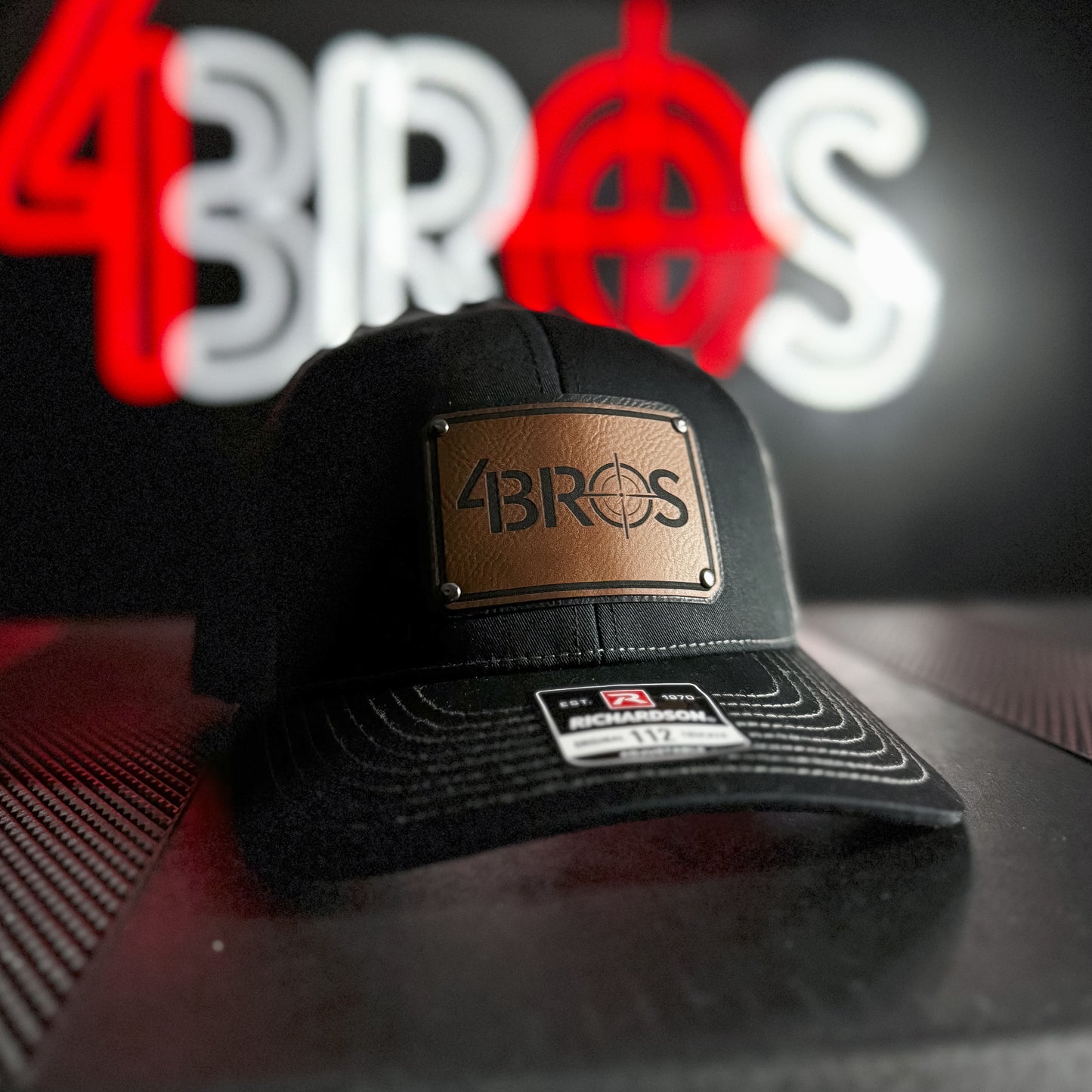 The Four Brothers Holsters 4Bros Trucker Hat isn't your most expensive, stay-at-home, clean-for-the-weekend hat. It is intended to be your everyday carry hat.