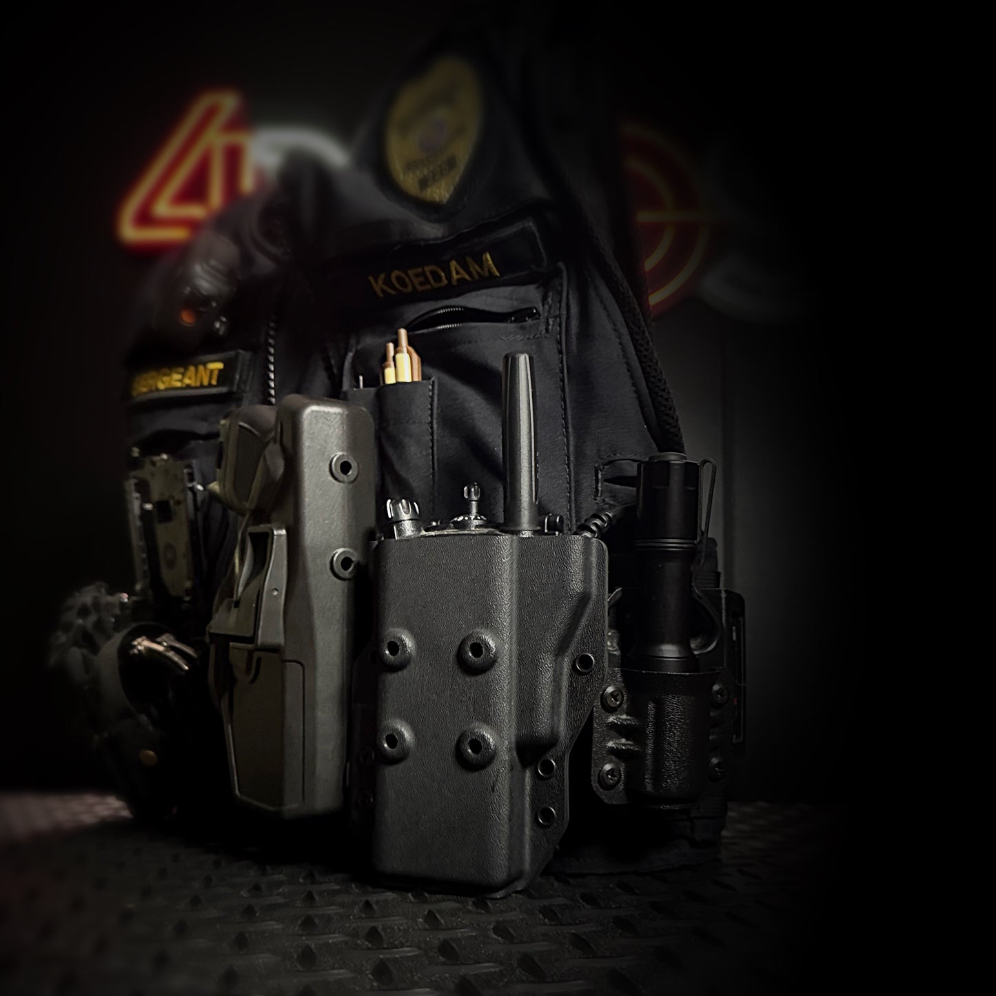 Outside Waistband Kydex Pancake-style holster or carrier for the Motorola APX 6000, 7000, and 8000 series portable radios from Four Brothers 4Bros Holsters.