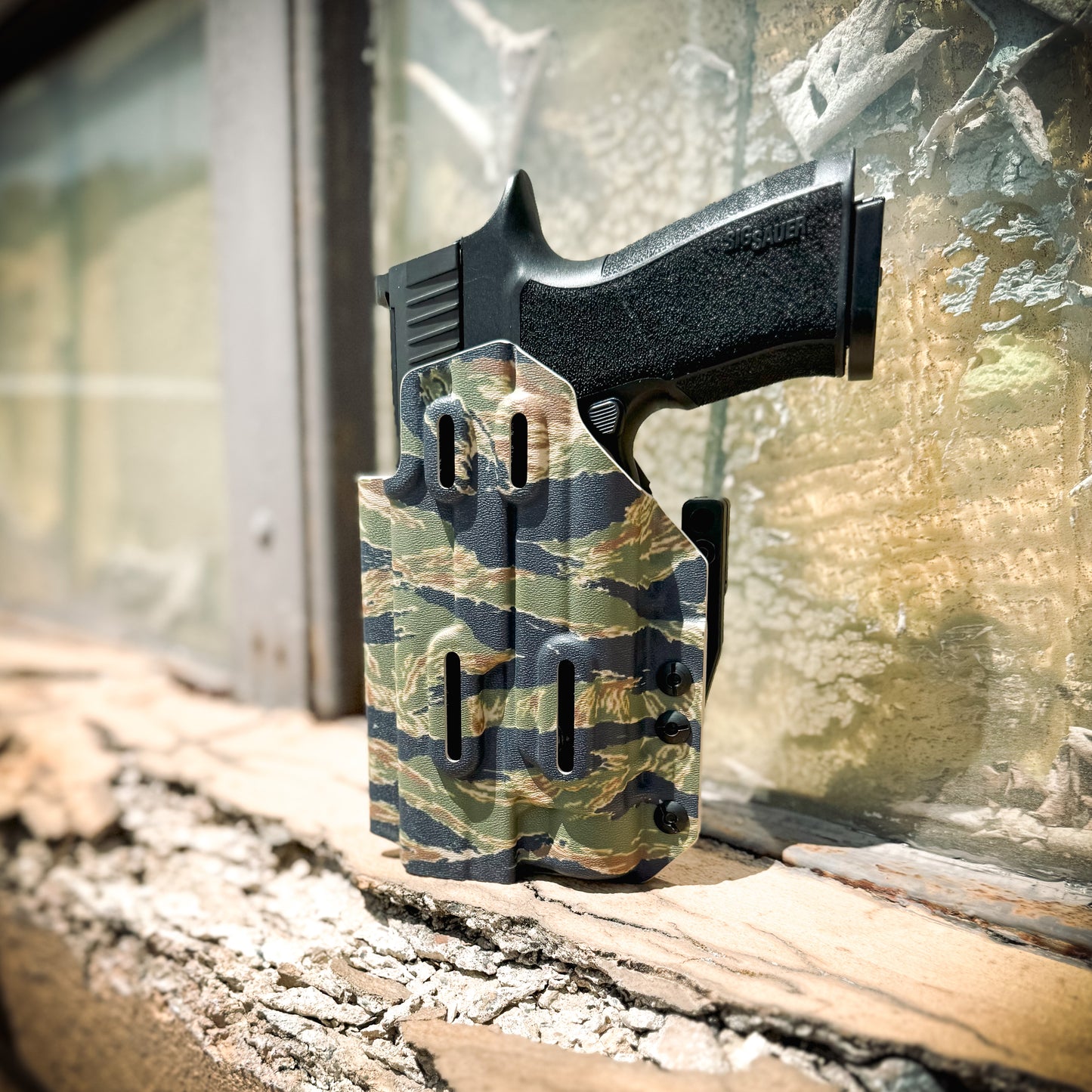 For the best IWB AIWB Inside Waistband Holster for the Sig Sauer P320-XTEN Comp with the Streamlight TLR-1 or TLR-1 HL shop Four Brothers 4BROS Holsters.