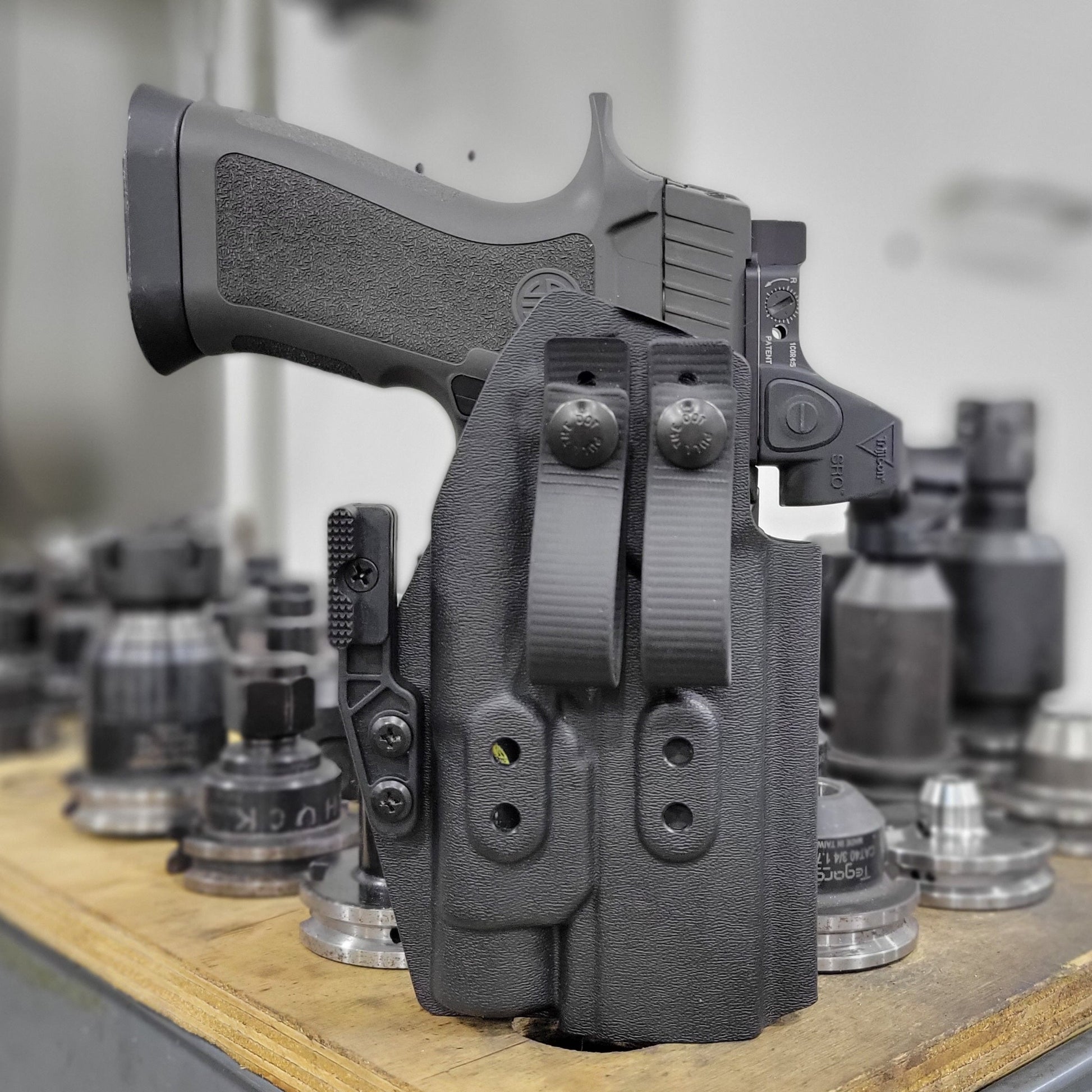 For the best IWB AIWB Inside Waistband Holster for the Sig Sauer P320 AXG pistols with the Streamlight TLR-1 or TLR-1 HL light, shop Four Brothers Holsters.