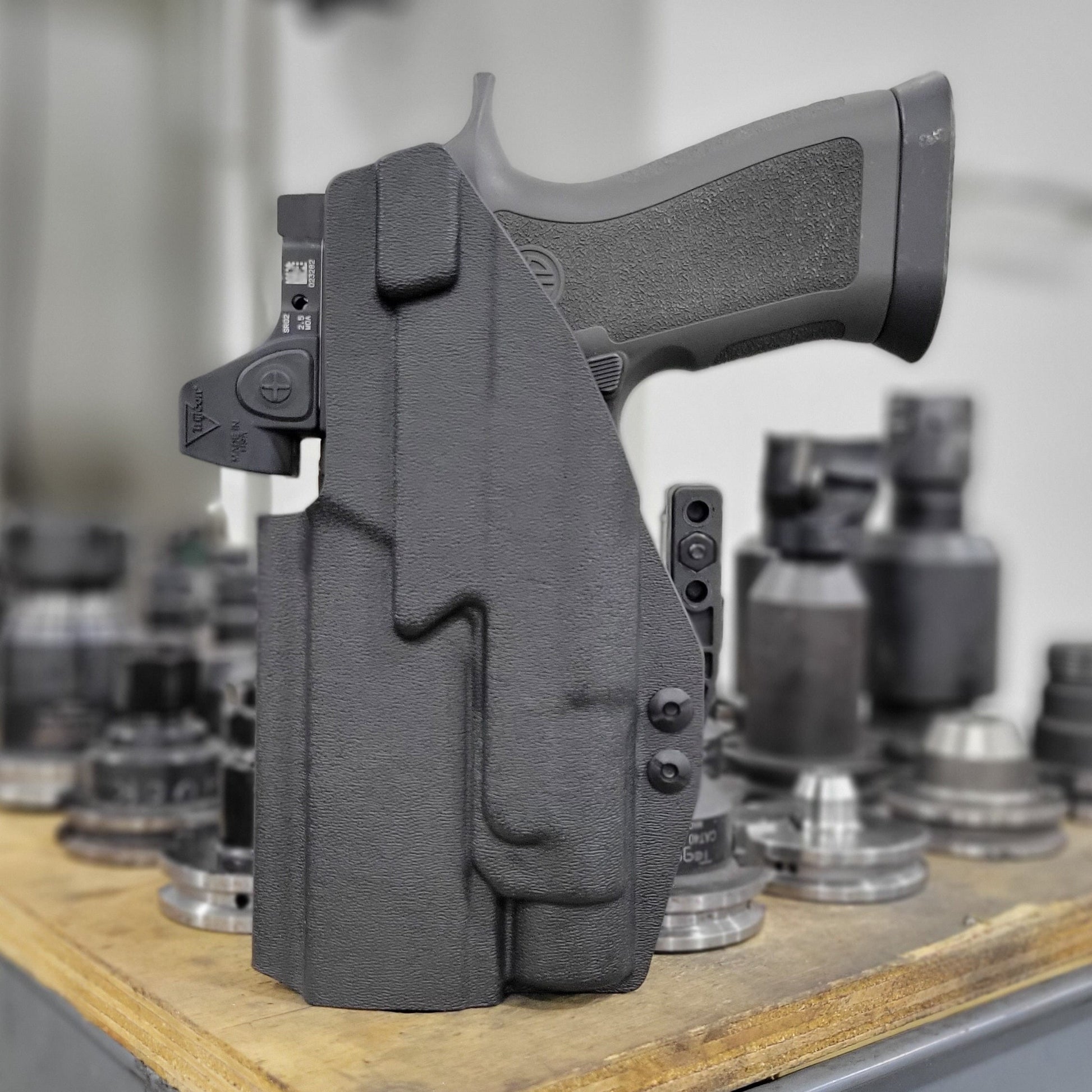 For the best IWB AIWB Inside Waistband Holster for the Sig Sauer P320 AXG pistols with the Streamlight TLR-1 or TLR-1 HL light, shop Four Brothers Holsters.