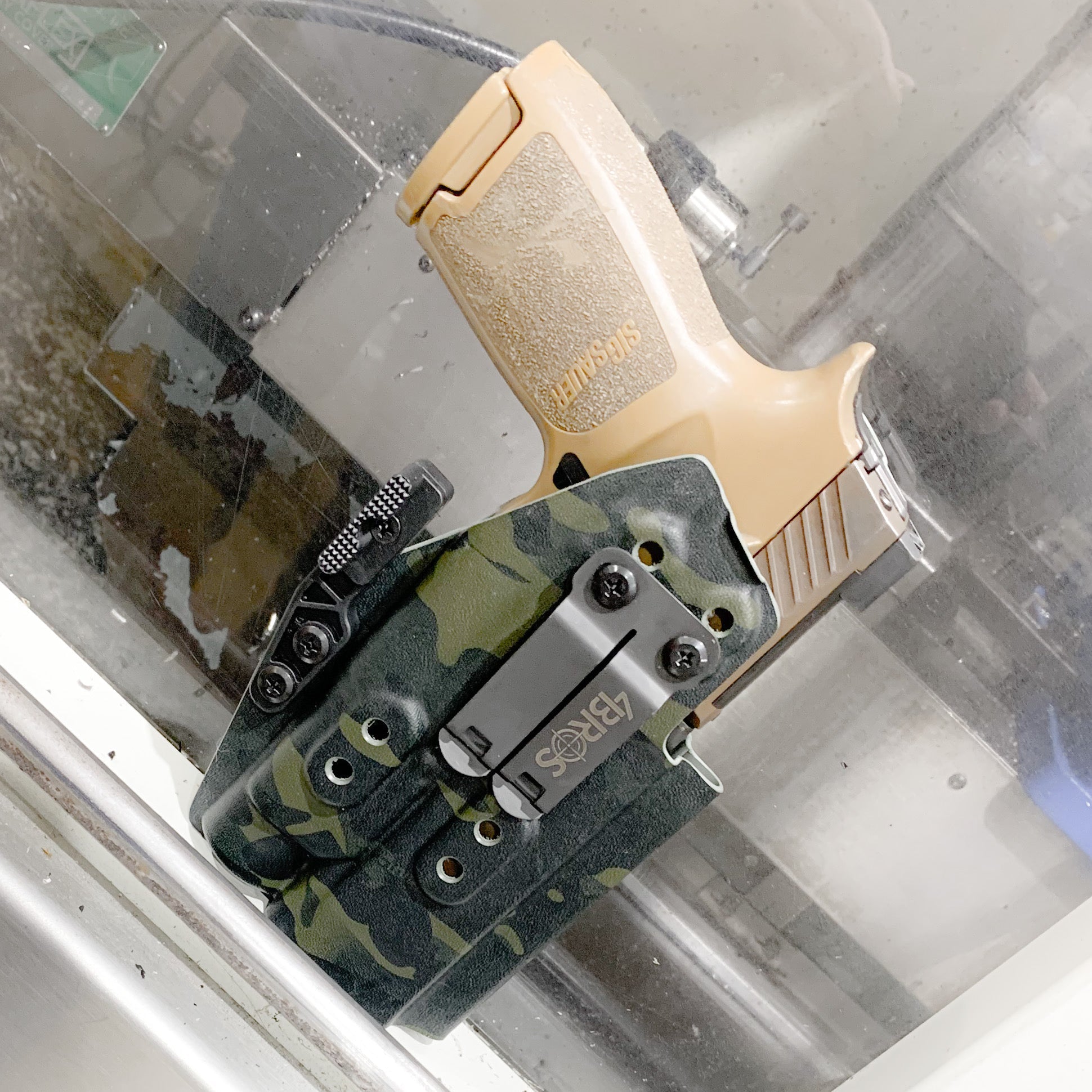 For the best IWB AIWB Inside Waistband Holster for the Sig Sauer P320 AXG pistols with the Streamlight TLR-1 or TLR-1 HL light, shop Four Brothers Holsters.