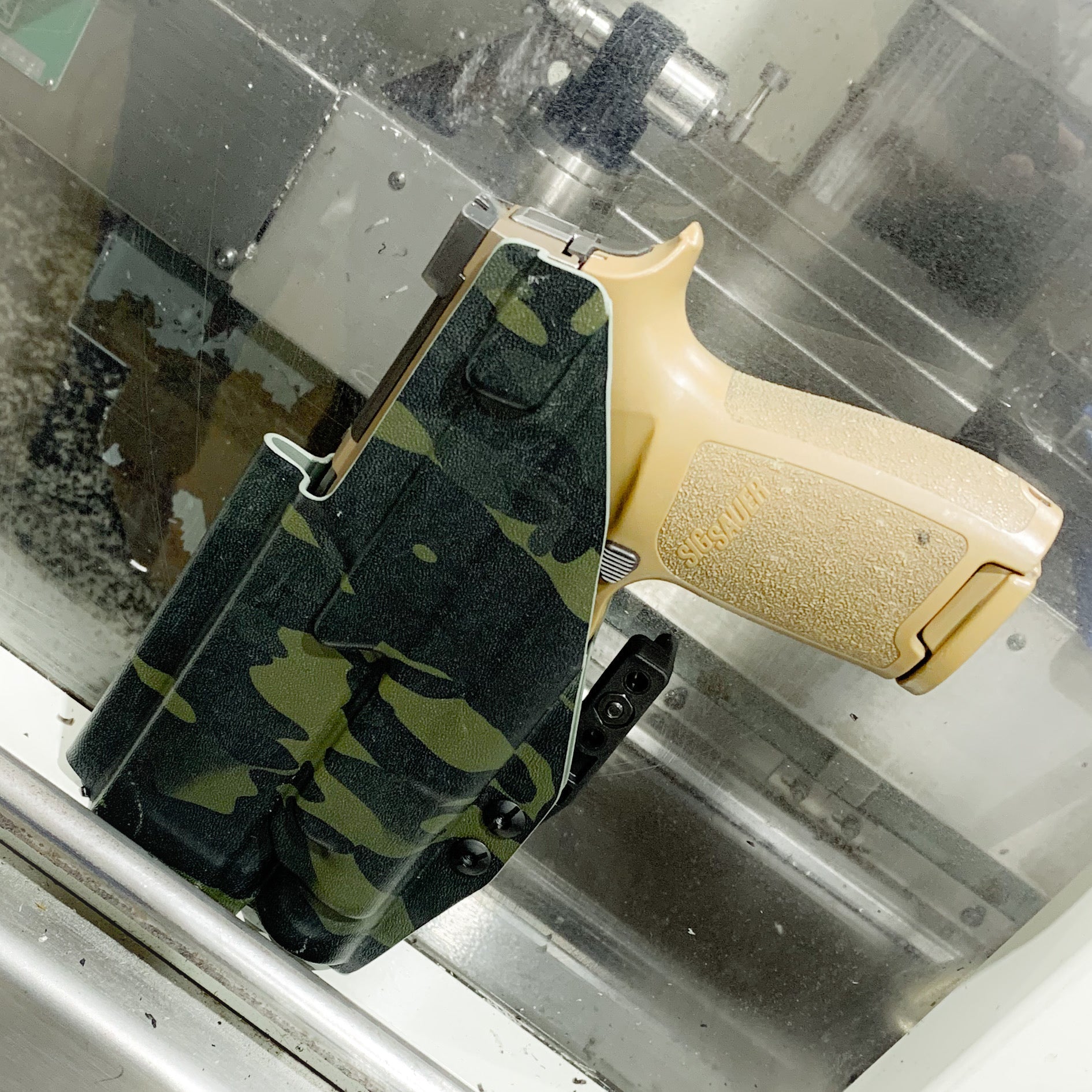 For the best IWB AIWB Inside Waistband Holster for the Sig Sauer P320 AXG pistols with the Streamlight TLR-1 or TLR-1 HL light, shop Four Brothers Holsters.