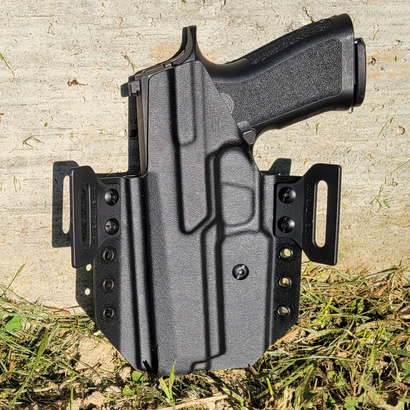 Outside Waistband Pancake Style Kydex holster for the Sig Sauer P320 from Four Brothers Holsters Adjustable retention, open muzzle, cleared for red dot sights