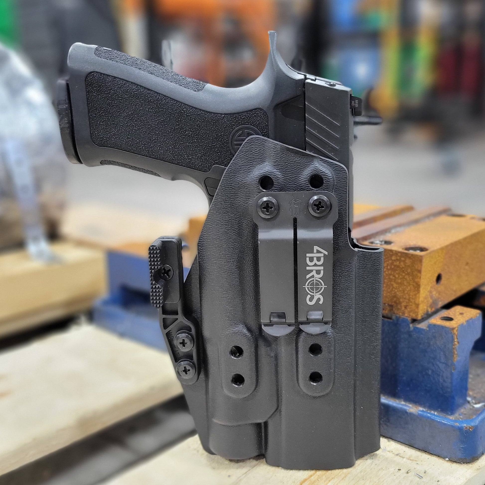 For the best IWB AIWB Inside Waistband Holster for the Sig Sauer P320 AXG pistols with the Streamlight TLR-1 or TLR-1 HL light, shop Four Brothers Holsters.