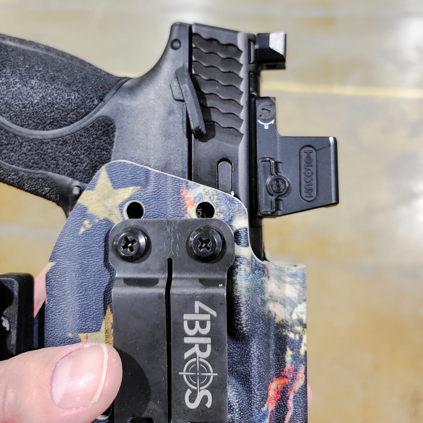 For the Best IWB AIWB Holster for the Smith and Wesson M&P 5.6" Performance Center 10MM M2.0 pistol with thumb safety & TLR-1, shop Four Brothers Holsters.