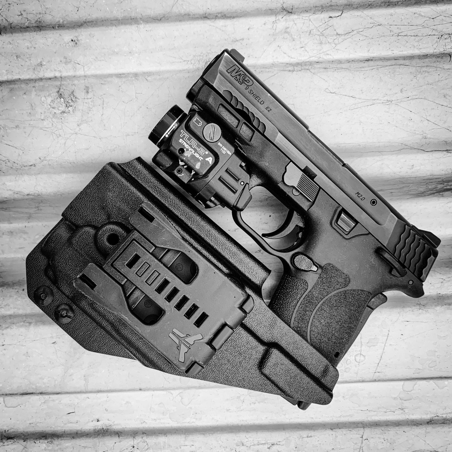For the best Outside Waistband OWB KYDEX Holster for the Smith & Wesson M&P 9 Shield EZ with Streamlight TLR-8 or TLR-8A, shop Four Brothers 4BROS Holsters.