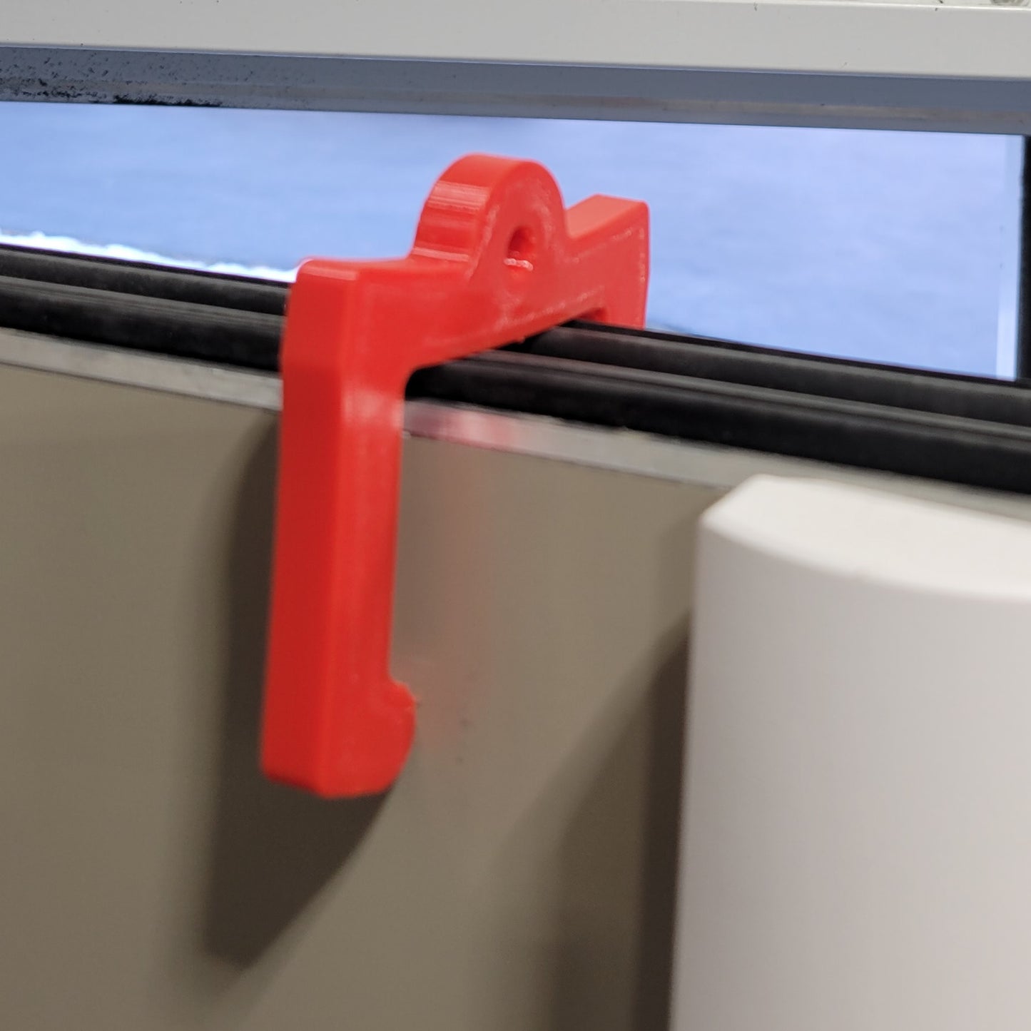 Four Brothers 4BROS 3D-printed Door Check is designed to allow any user to keep any door from 1" to 2" thick open from friction applied by the flexible stop.