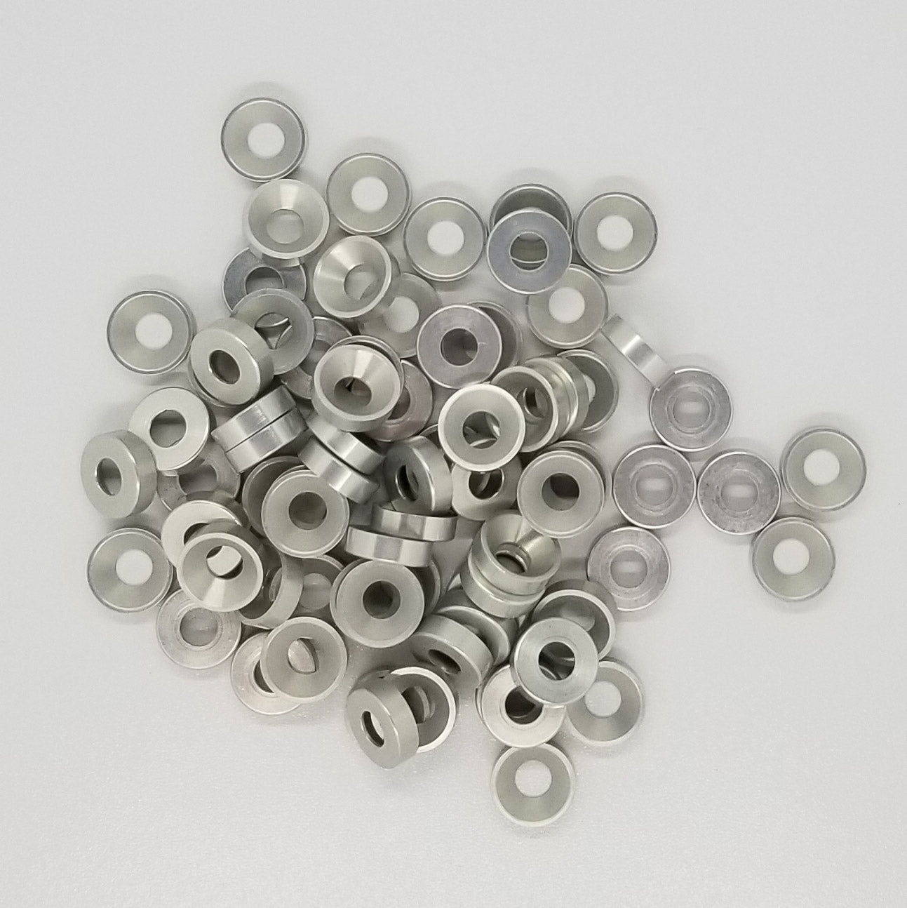 #8 Aluminum Clear Anodized per military specs Finish Washer Machined & Chamfer cut for a standard #8 flat head cap screw or #8 truss head screw. Made in USA