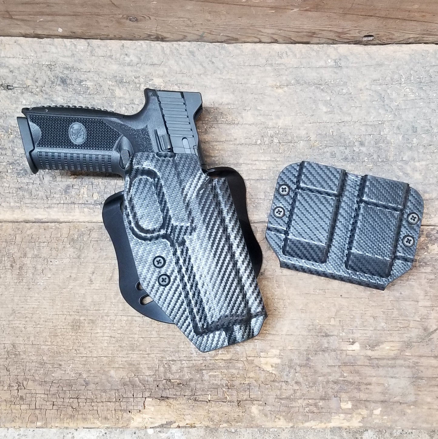 For the best Outside Waistband OWB Holster for the FN 509 standard & Tactical versions with the Apex 5.00" Slide or FN 509 LS Edge, shop Four Brothers Holsters.