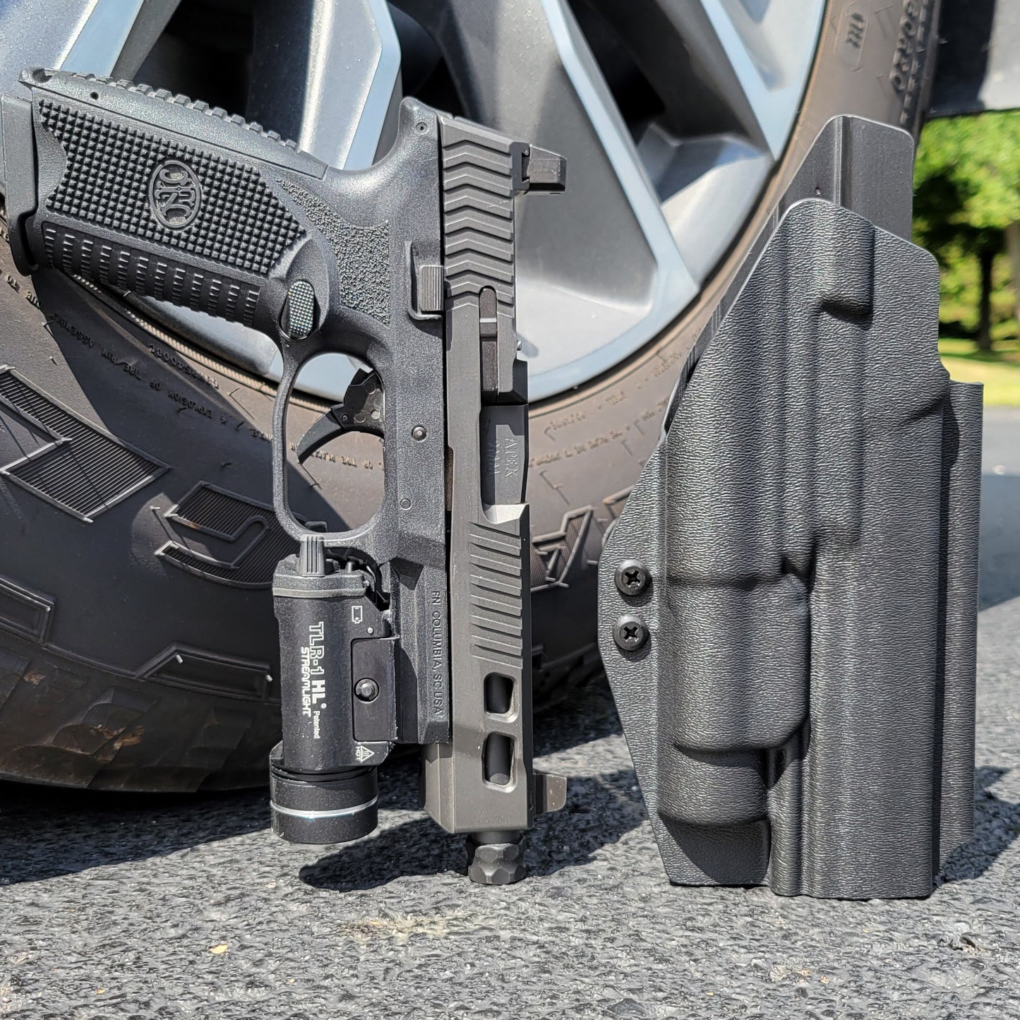 For the best Outside Waistband OWB Holster for the FN 509 LS Edge, 509 Full Size & 509 Tactical & Apex 5" Slide & Streamlight TLR-1 shop Four Brothers Holsters.