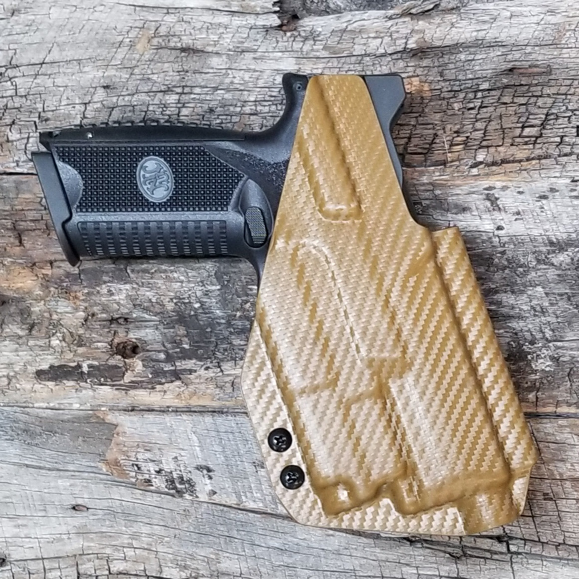 For the best Outside Waistband OWB Holster for the FN 509 compact, 509, and 509 Tactical with the OLight PL-MINI 2 Valkyrie, shop Four Brothers 4BROS Holsters.