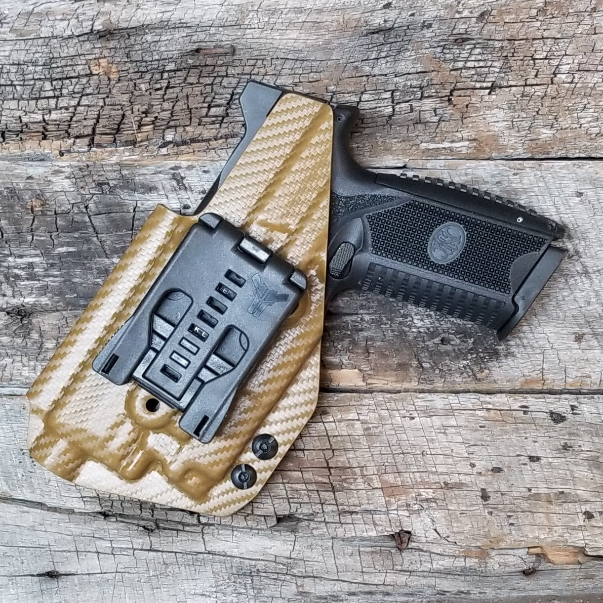For the best Outside Waistband OWB Holster for the FN 509 compact, 509, and 509 Tactical with the OLight PL-MINI 2 Valkyrie, shop Four Brothers 4BROS Holsters.