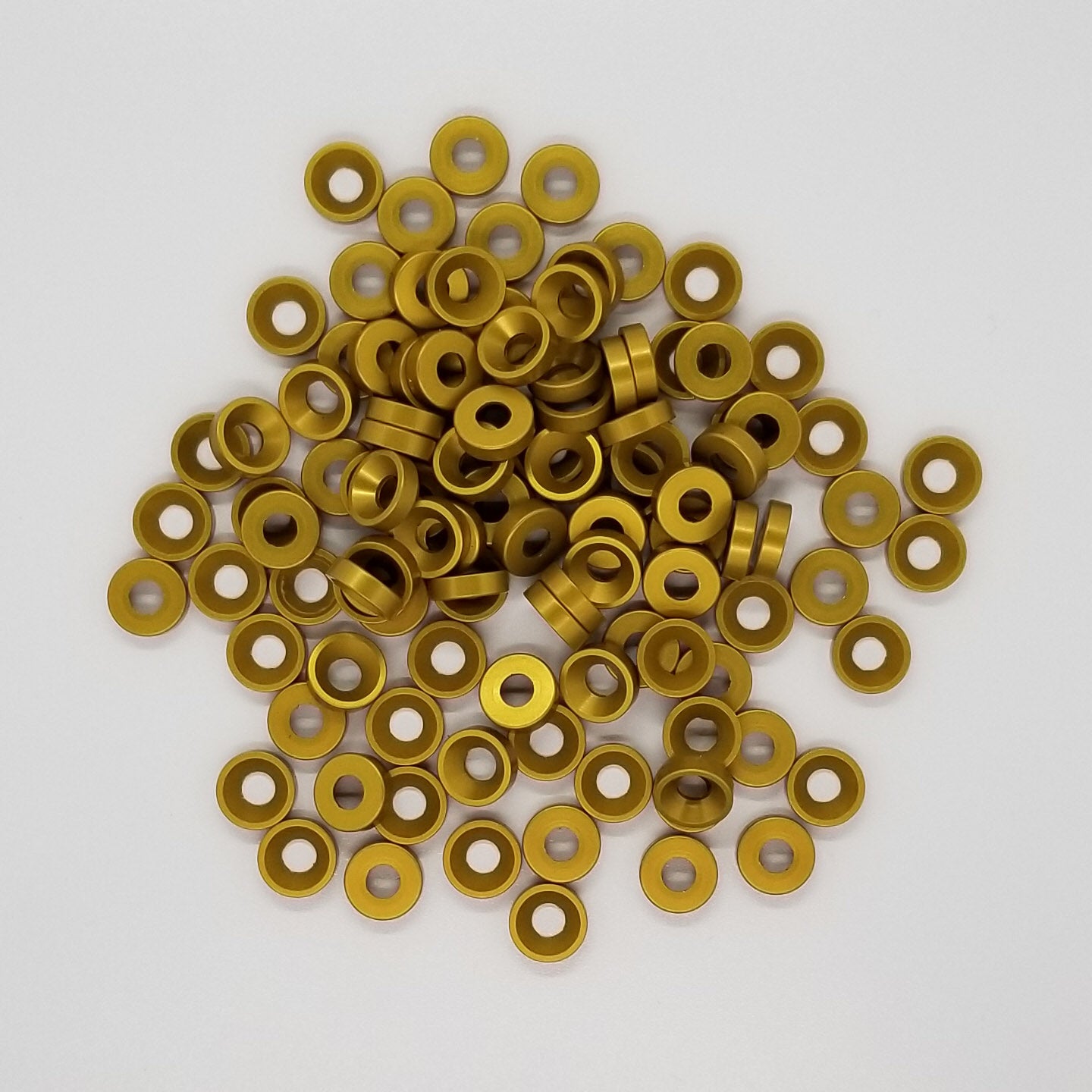 #8 Aluminum Finish Washer, Gold Anodized per military specs Machined washer, not stamped Chamfer cut specifically for a standard #8 flat head cap screw