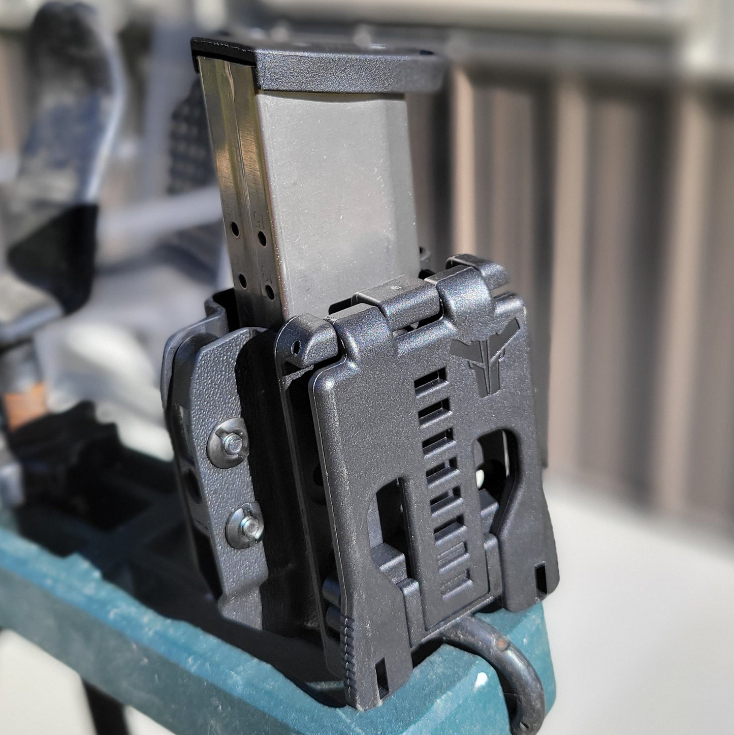 For the best OWB Outside Kydex Magazine Pouch for Sig, S&W, Walther, Glock and other double stack 10mm and 45 ACP pistol magazines shop Four Brothers Holsters.