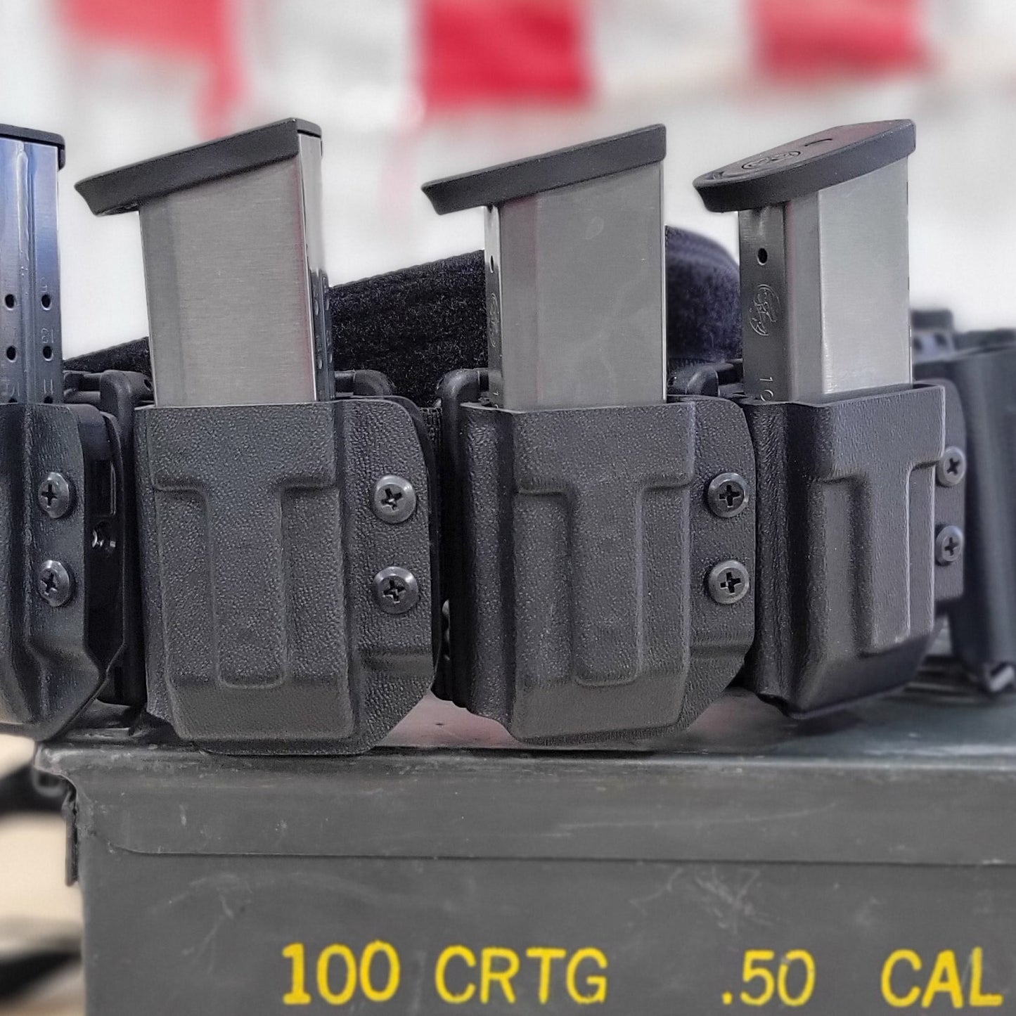 For the best OWB Outside Kydex Magazine Pouch for Sig, S&W, Walther, Glock and other double stack 10mm and 45 ACP pistol magazines shop Four Brothers Holsters.