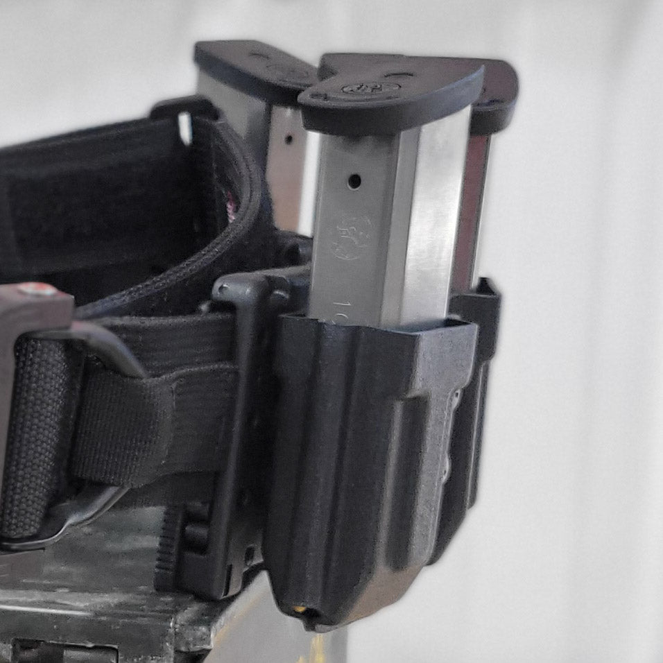 For the best OWB Outside Kydex Magazine Pouch for Sig, S&W, Walther, Glock and other double stack 10mm and 45 ACP pistol magazines shop Four Brothers Holsters.