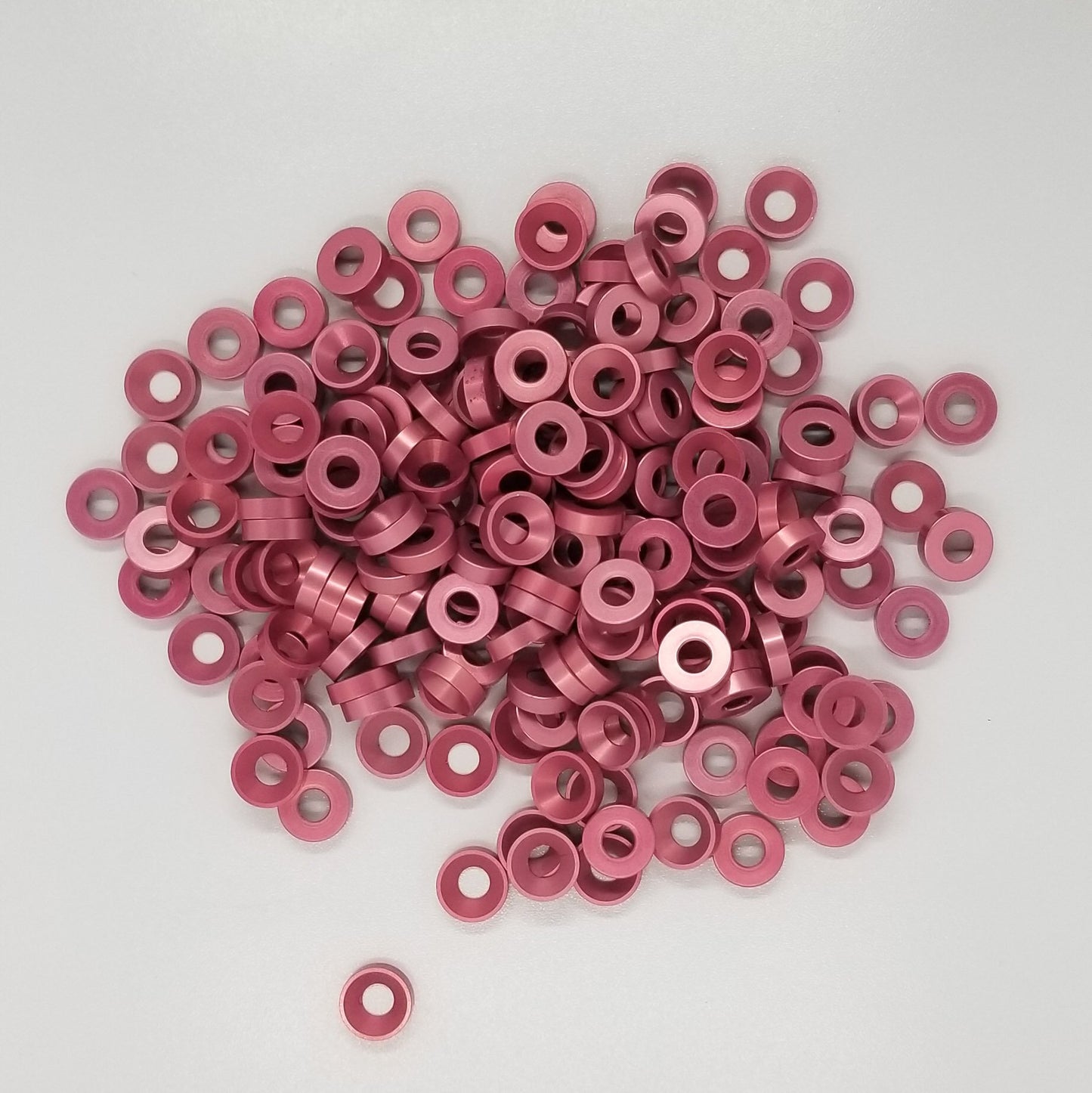 #8 Aluminum Prink Anodized per military specs Finish Washer Machined & Chamfer cut for a standard #8 flat head cap screw or #8 truss head screw. Made in USA