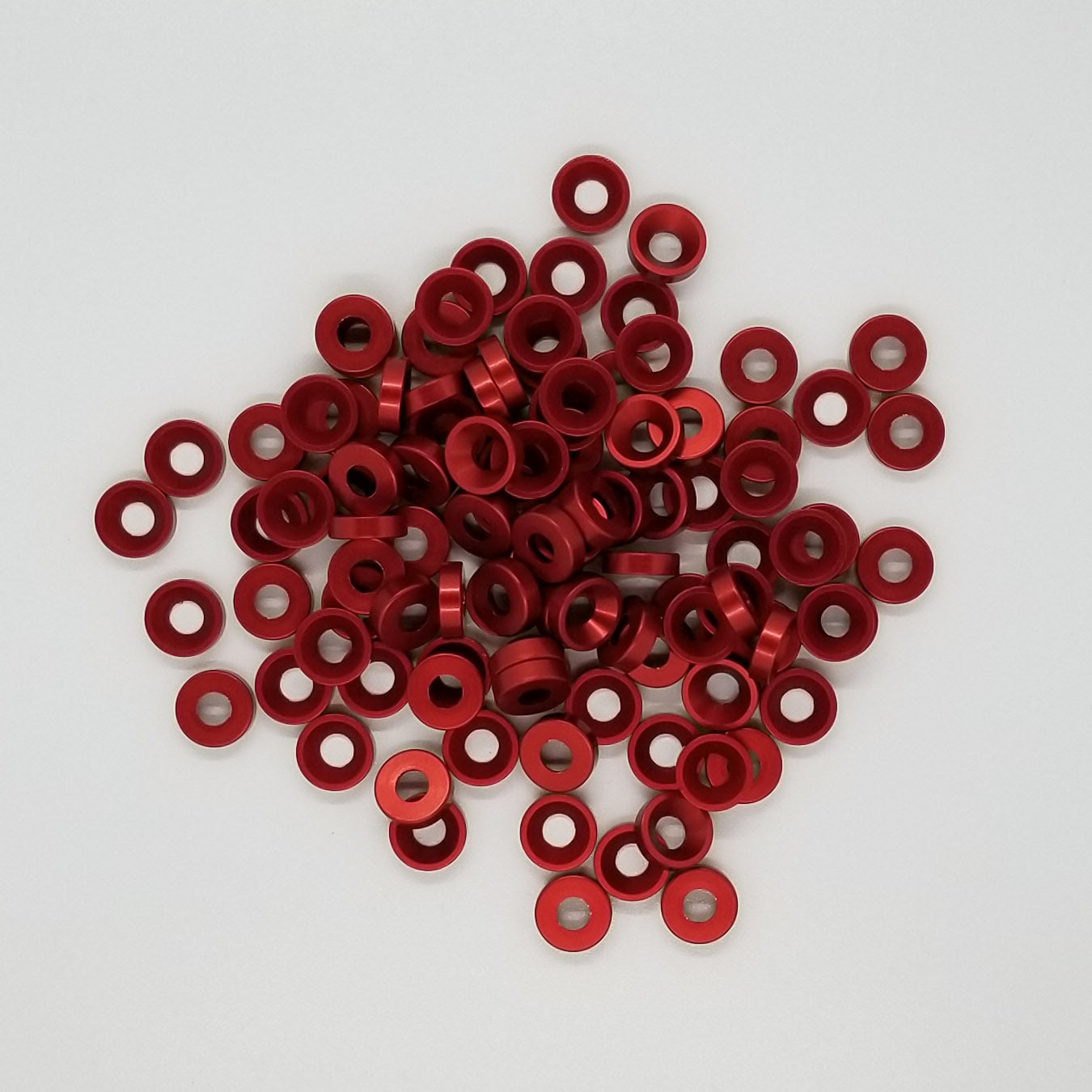 #8 Aluminum Finish Washer, Red Anodized per military specs Machined washer, not stamped Chamfer cut specifically for a standard #8 flat head cap screw