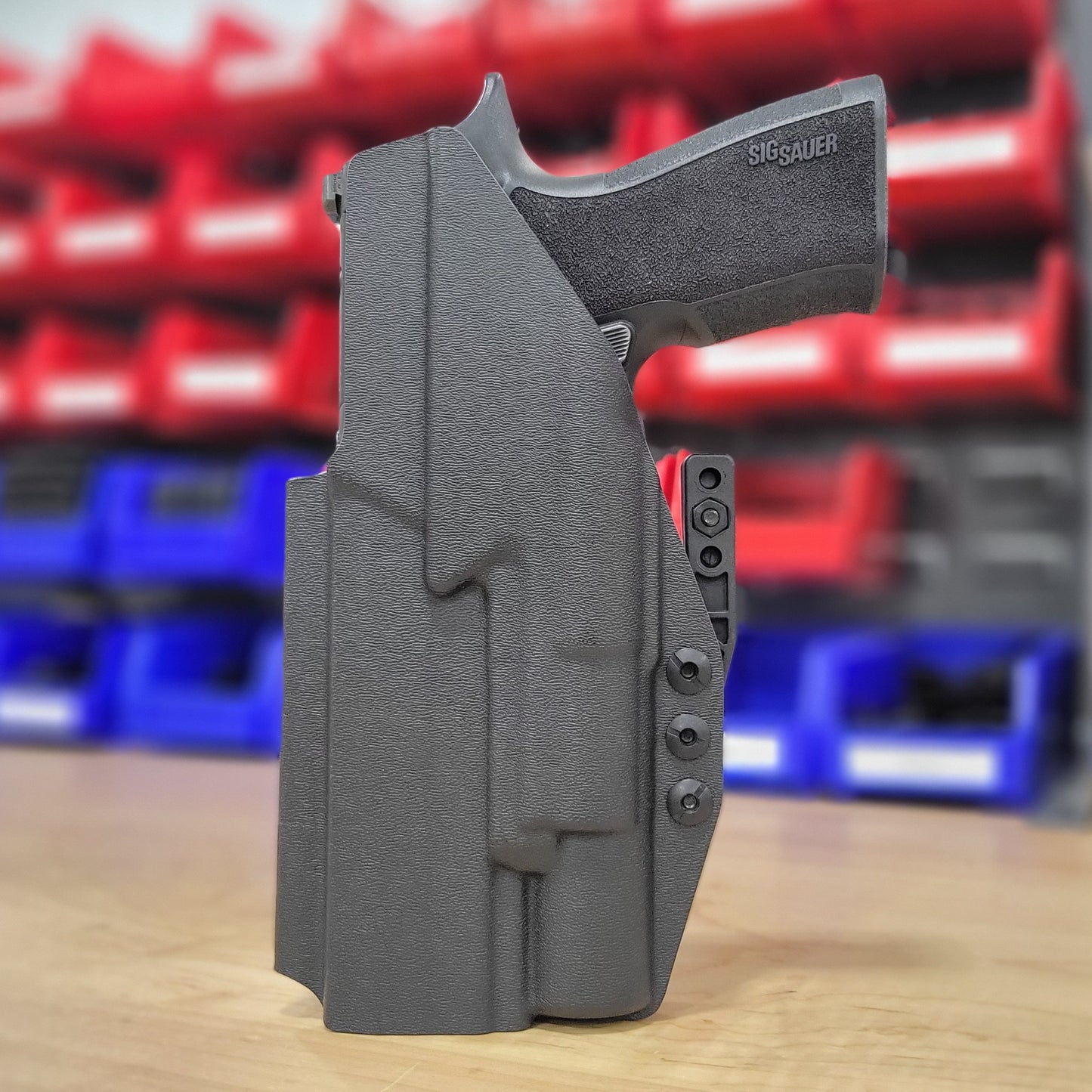 For the best Inside Waistband IWB AIWB holster for the Sig Sauer 10MM P320-XTEN and Surefire X-300U A or B shop Four Brothers 4BROS Holsters. Made in the USA.