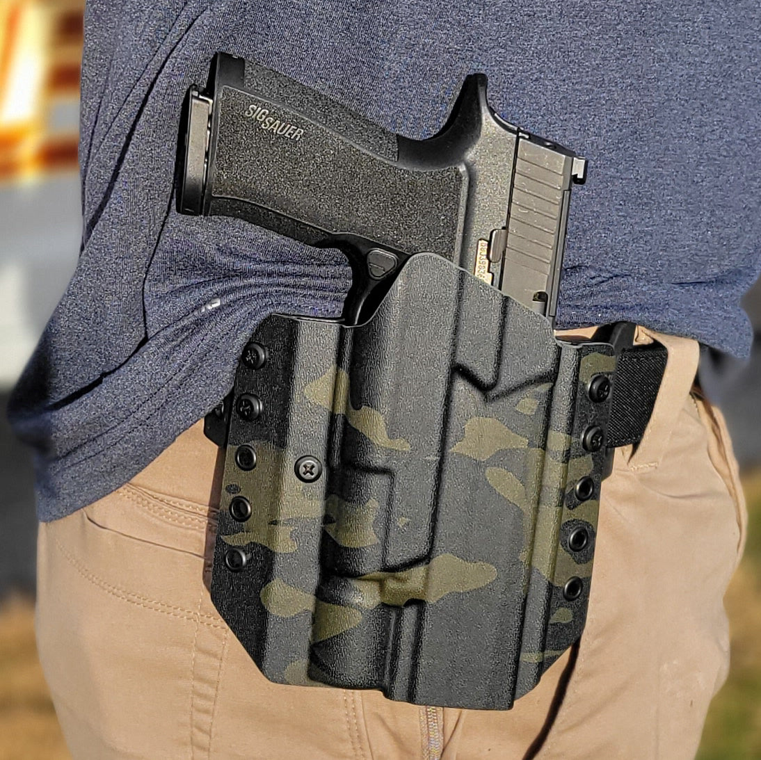 Outside Waistband Pancake Style Kydex holster designed to fit the Sig Sauer 10MM P320-XTEN and Surefire X-300U. Adjustable retention, open muzzle, optic ready.