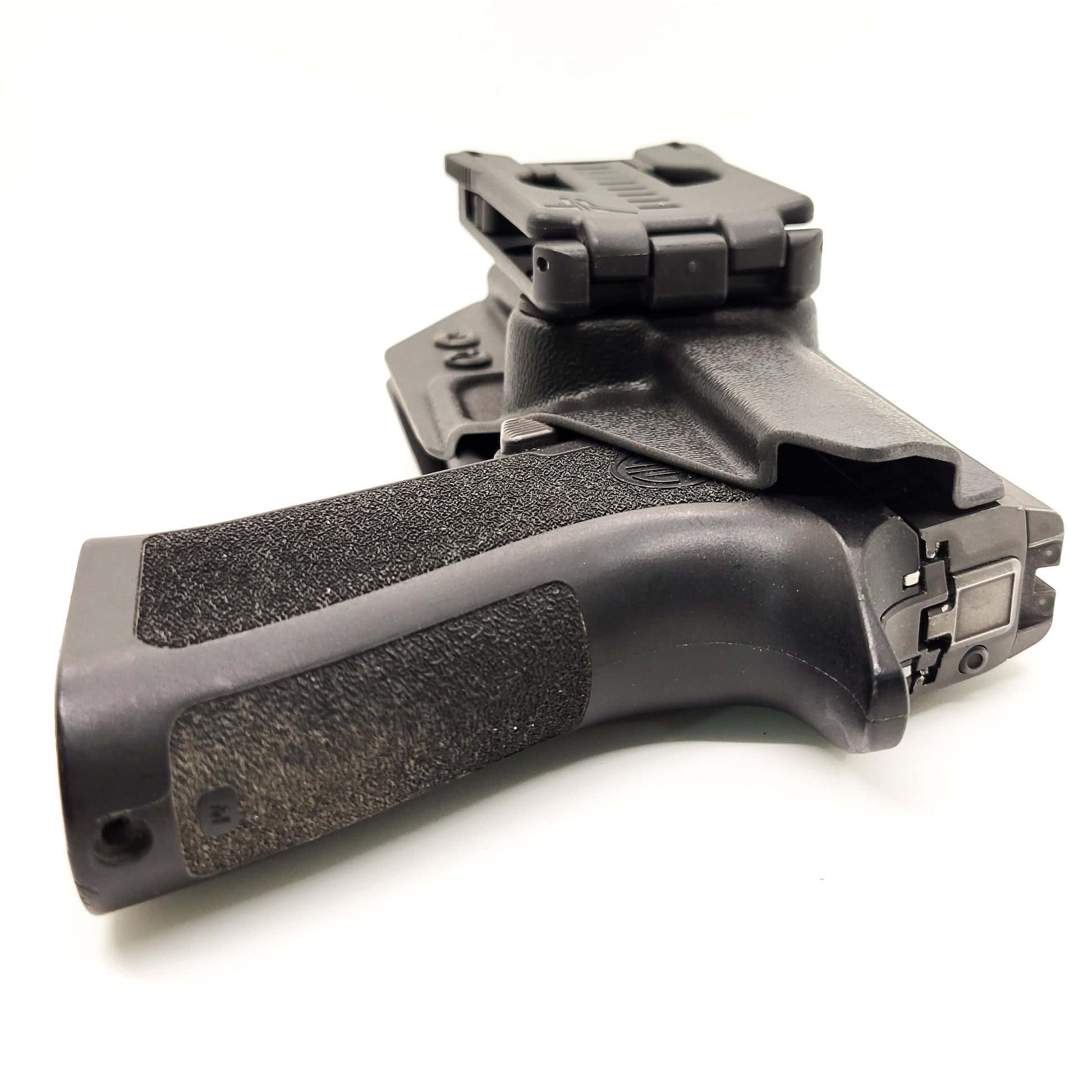 For the best Outside Waistband Holster for Sig Sauer P320 Carry, Compact, M18 or P320  Wilson Combat Carry grip module & Gas Pedal shop Four Brothers Holsters.