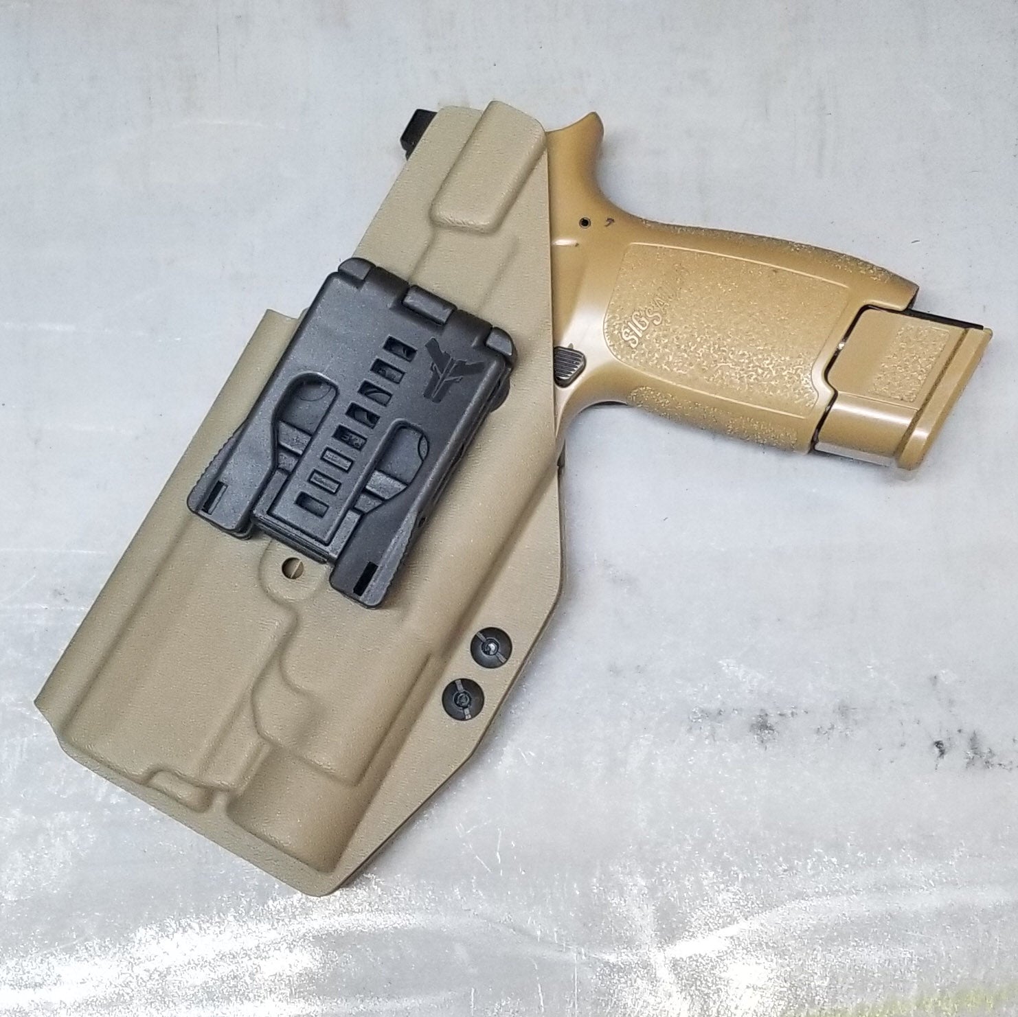 For the best OWB Holster for the Sig Sauer P320 Full Size, Carry, Compact, M17, M18, X-Five or X5 pistol & Streamlight TLR-1, shop Four Brothers Holsters.