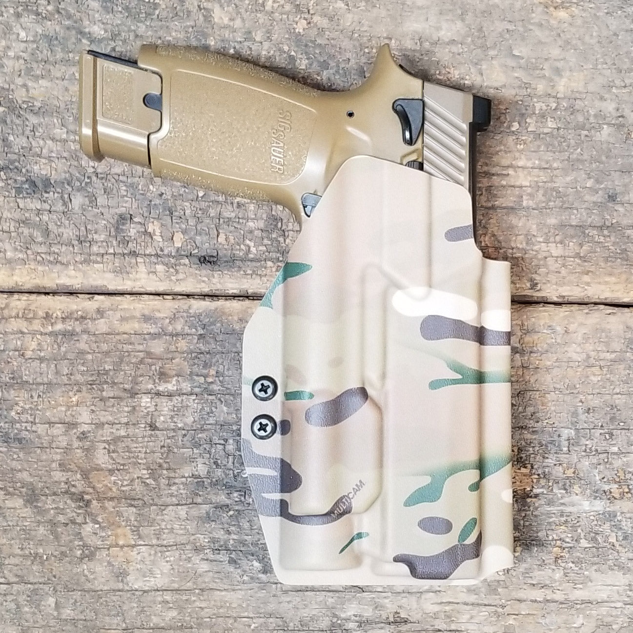 For the best OWB Holster for the Sig Sauer P320 Full Size, Carry, Compact, M17, M18, X-Five or X5 pistol & Streamlight TLR-1, shop Four Brothers Holsters.