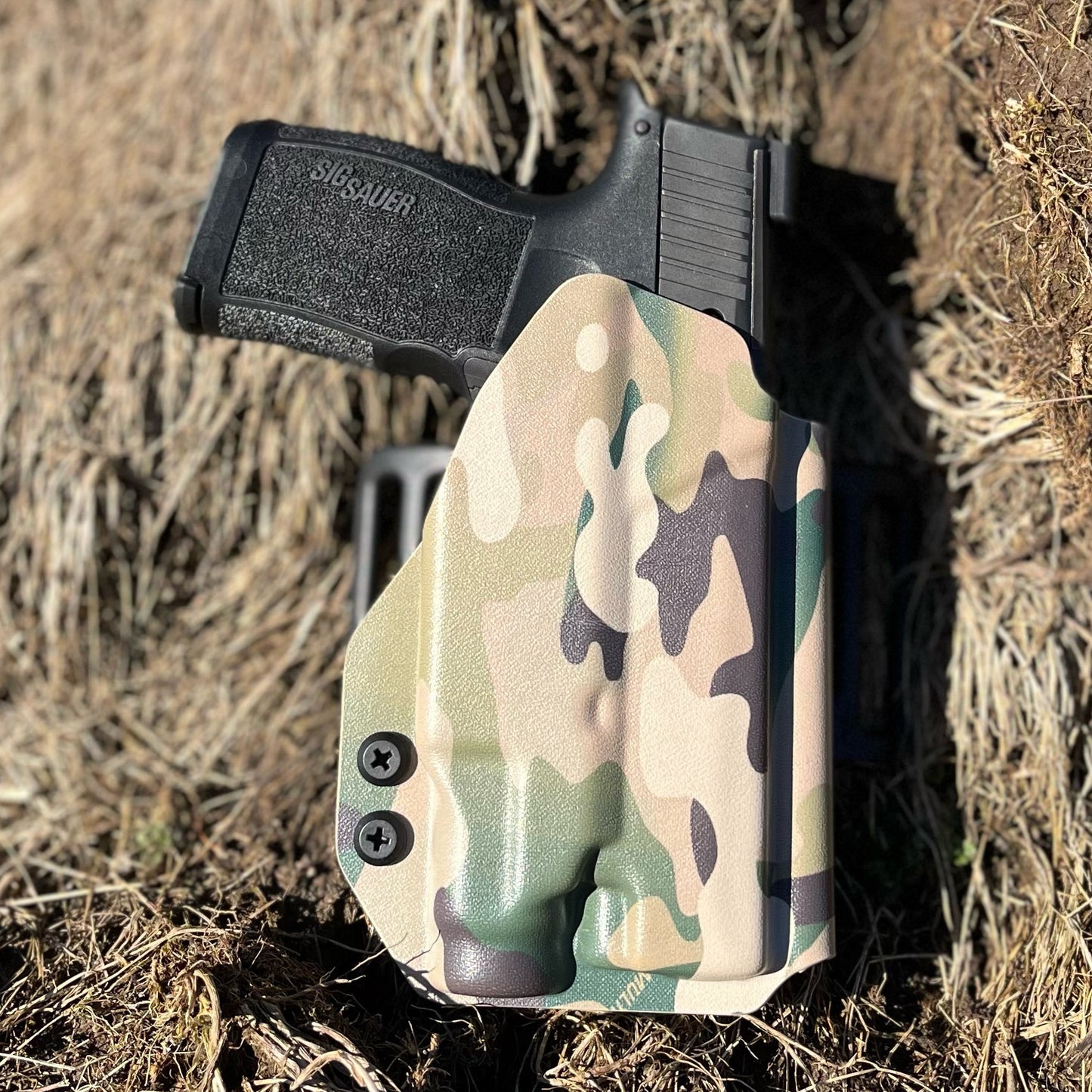 For the best OWB Outside Waistband Holster for the Sig Sauer P365XL pistol & Streamlight TLR-7 Sub light mounted to the handgun shop Four Brothers Holsters.