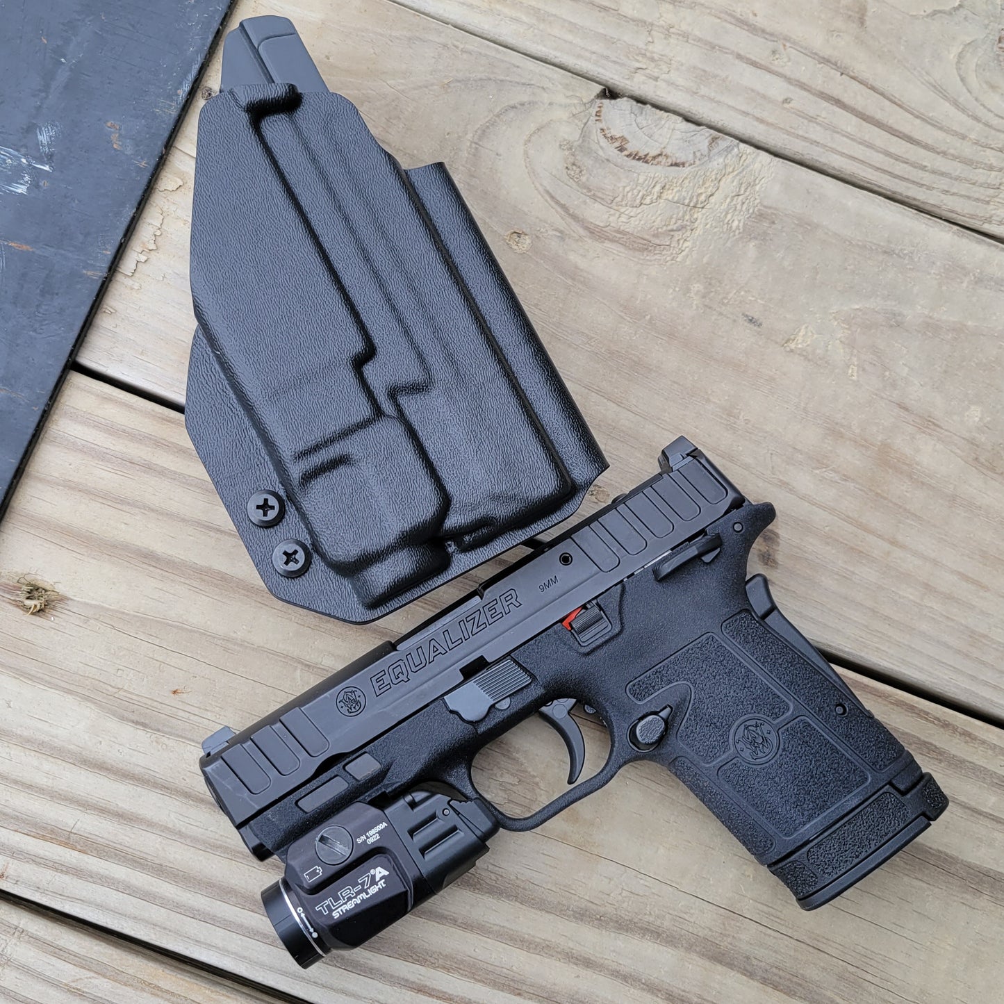 For the best Outside Waistband OWB Kydex holster for the Smith & Wesson EQUALIZER with the Streamlight TLR-7 X or TLR-7 A, shop Four Brothers 4BROS Holsters.