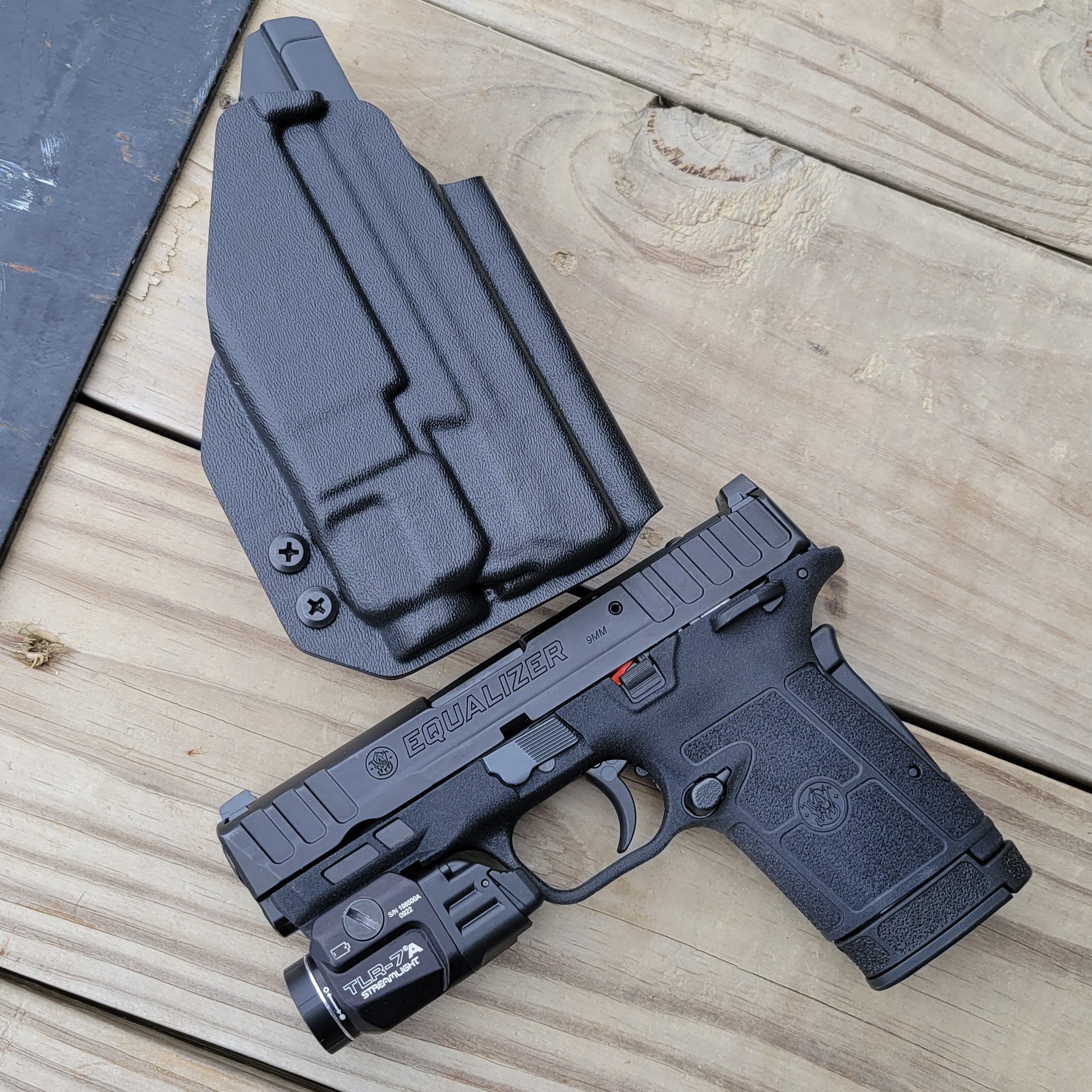 For the best Outside Waistband OWB Kydex holster for the Smith & Wesson EQUALIZER with the Streamlight TLR-7 X or TLR-7 A, shop Four Brothers 4BROS Holsters.