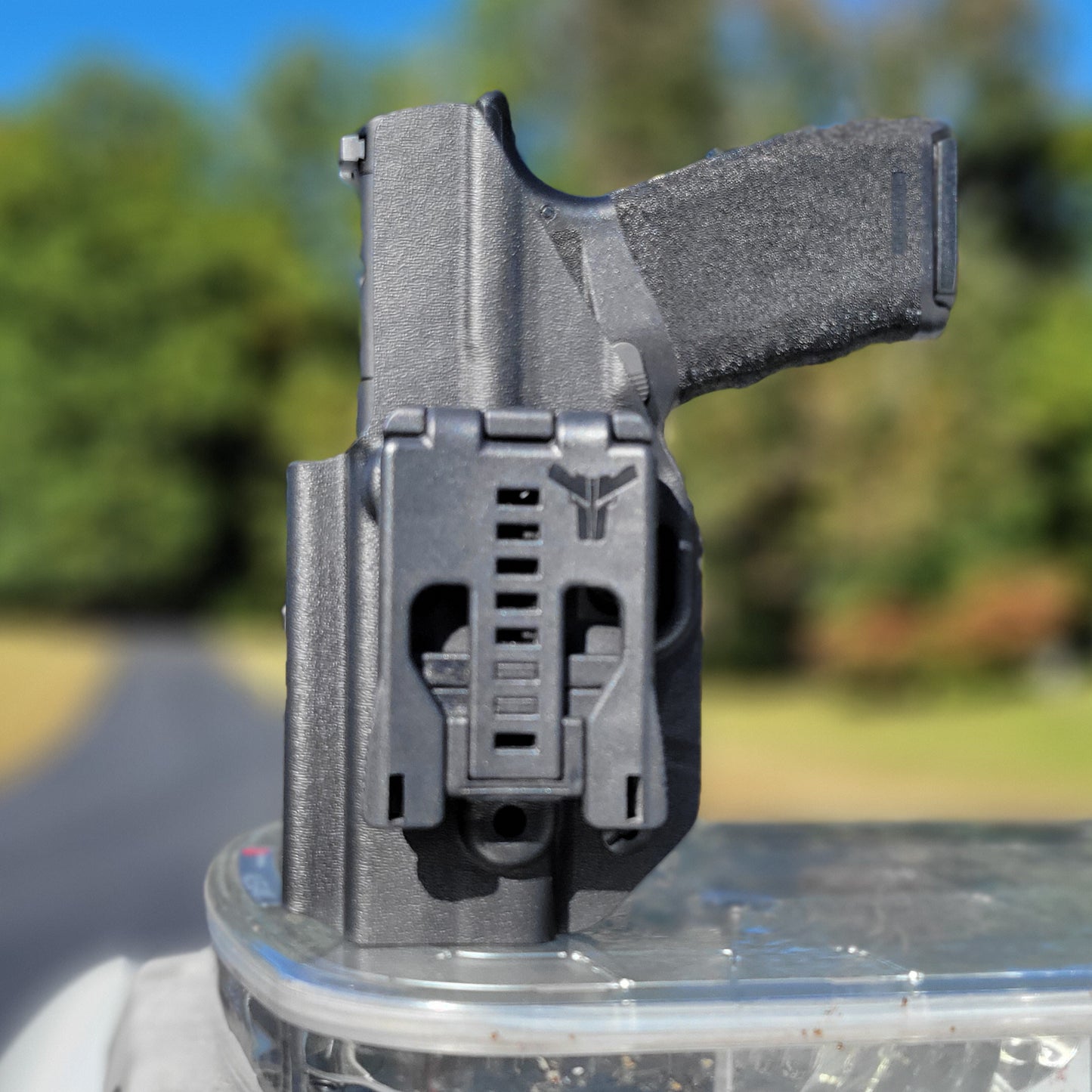 For the best Outside Waistband OWB Holster for the Springfield Armory Hellcat Pro handgun with or without a red dot sight shop Four Brothers 4BROS Holsters.