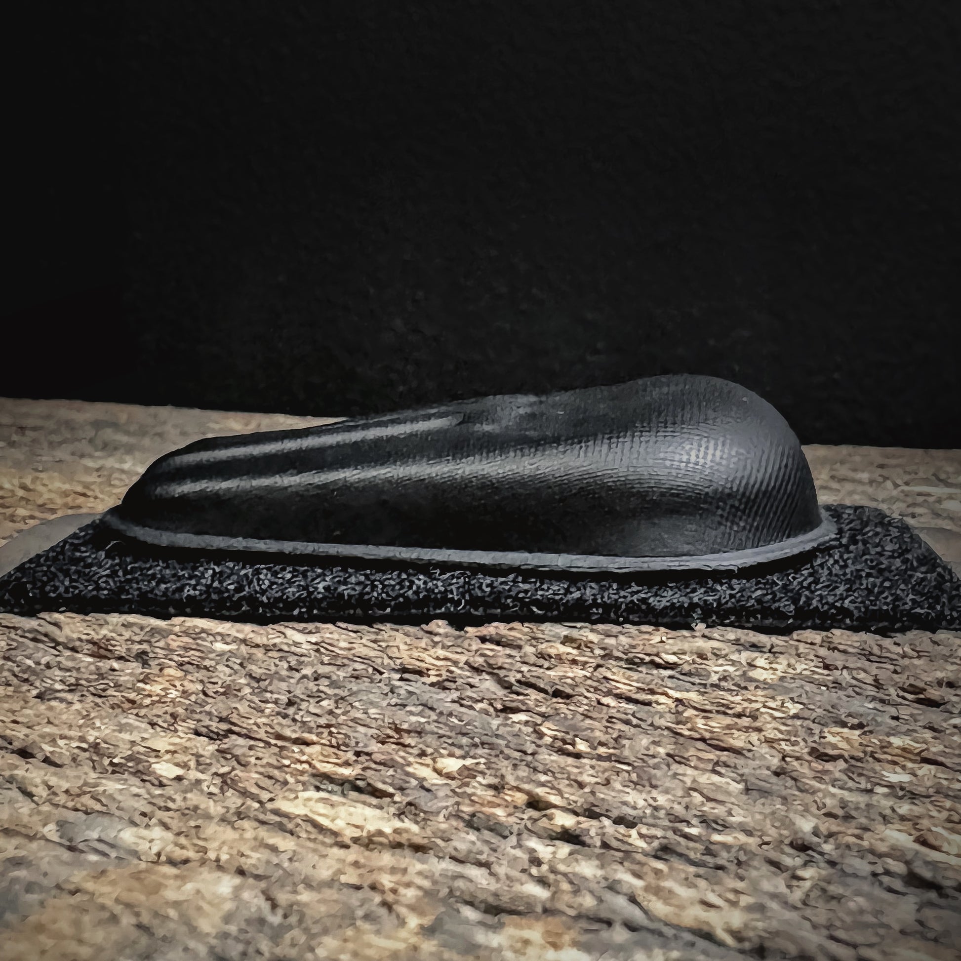 Compression-formed 4Bros Holster Wedge with textured airflow surface and hook and loop attachment 