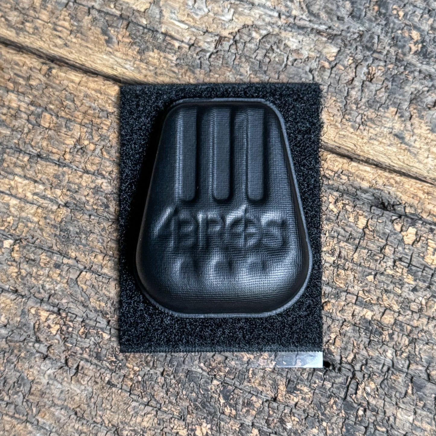 Compression-formed 4Bros Holster Wedge with textured airflow surface and hook and loop attachment 