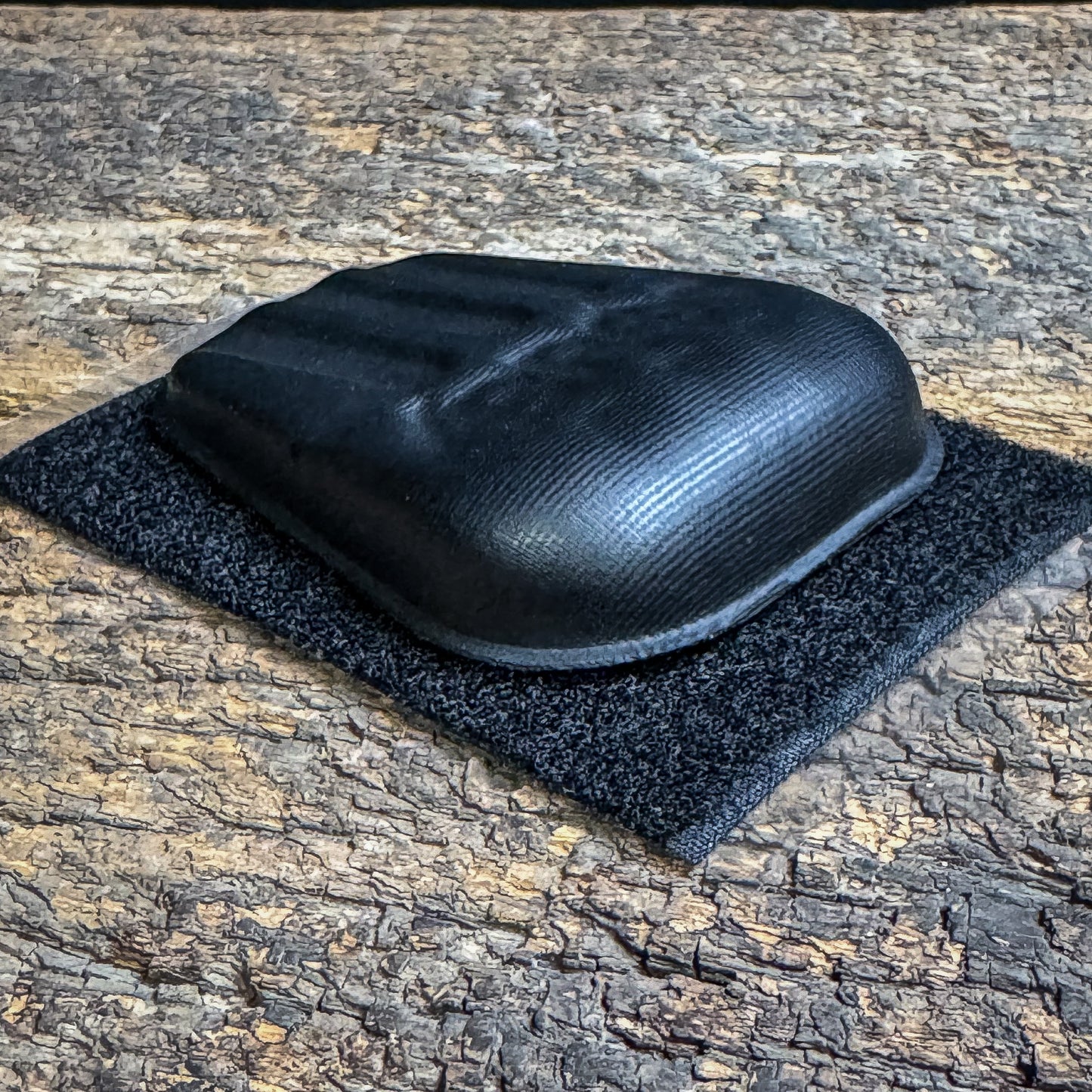 Compression-formed 4Bros Holster Wedge with textured airflow surface and hook and loop attachment 