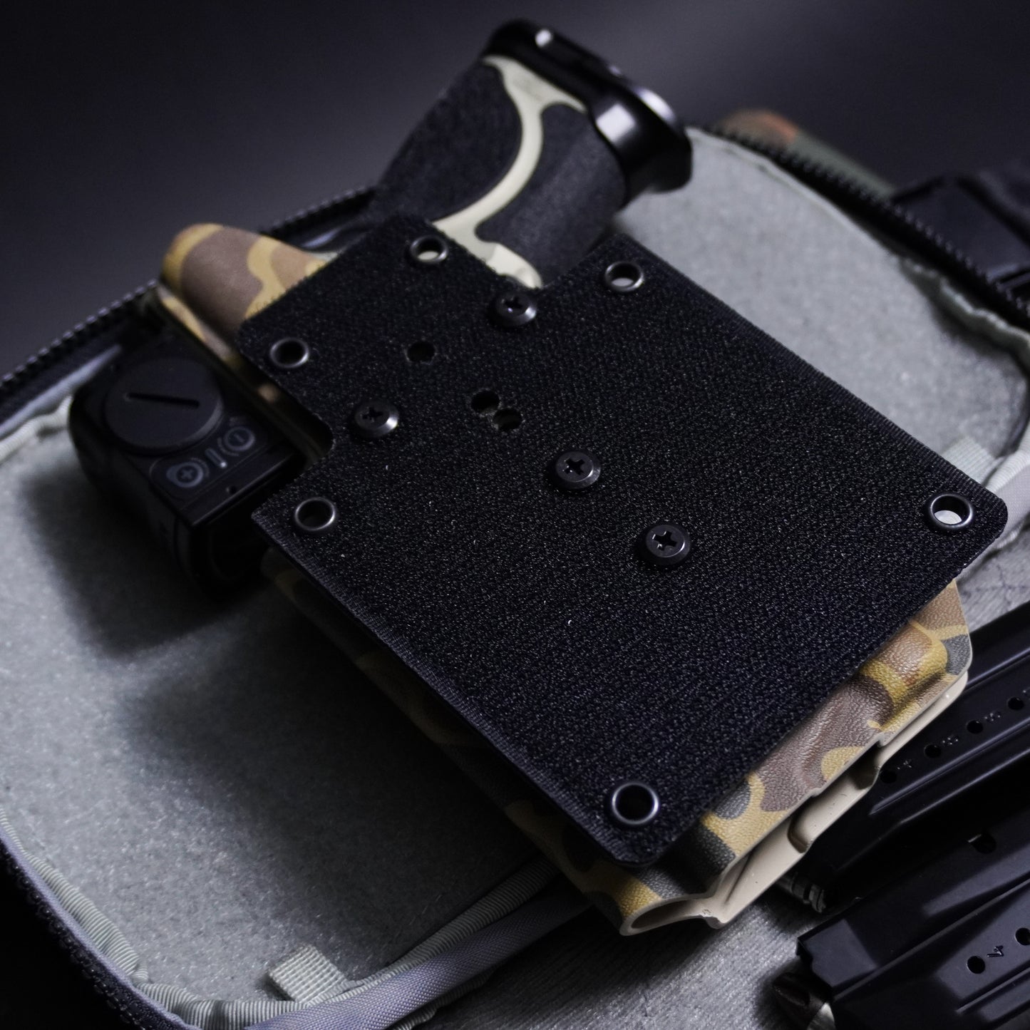 4BROS Hook & Loop Holster Mount fits Velcro-compatible backpack and sling bag panels for reliable EDC carry