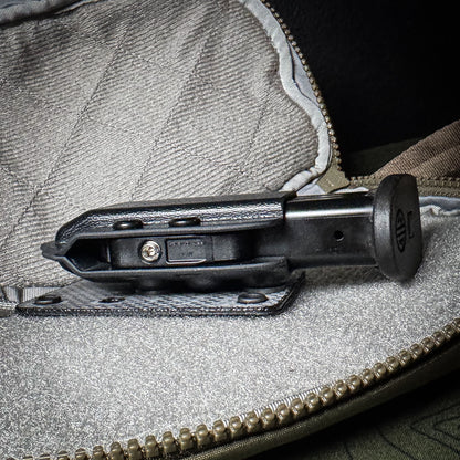 Hook and Loop magazine and accessory mount for backpacks and sling bags. Fits Velcro-compatible panels for secure off-body EDC carry. Made in the USA