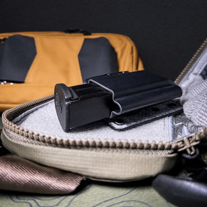Hook and Loop magazine and accessory mount for backpacks and sling bags. Fits Velcro-compatible panels for secure off-body EDC carry. Made in the USA